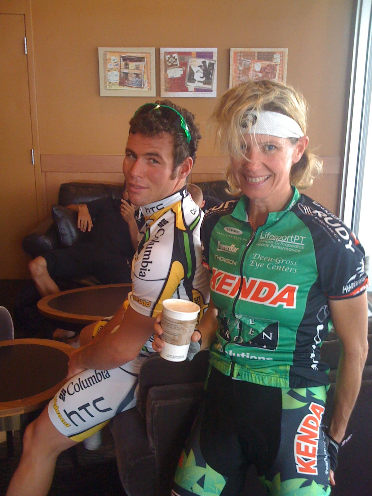 Catherine with Mark Cavendish at Starbucks before the race. She told him he would win for sure. Who is bigger?