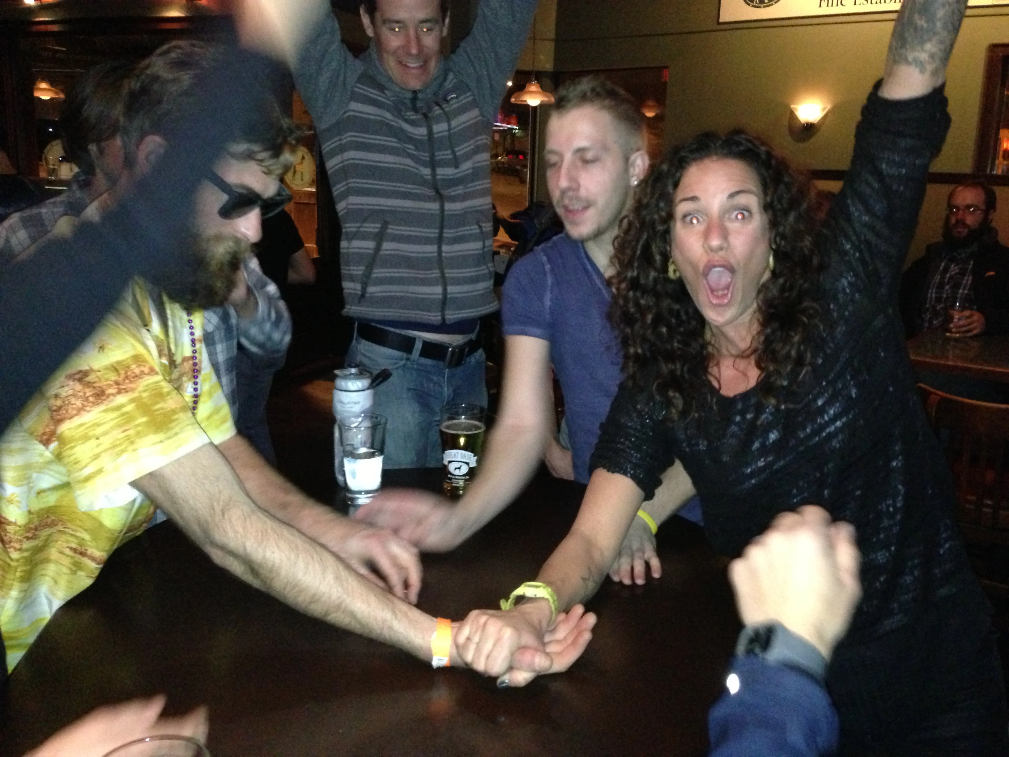 Arm wrestling at the after race party.