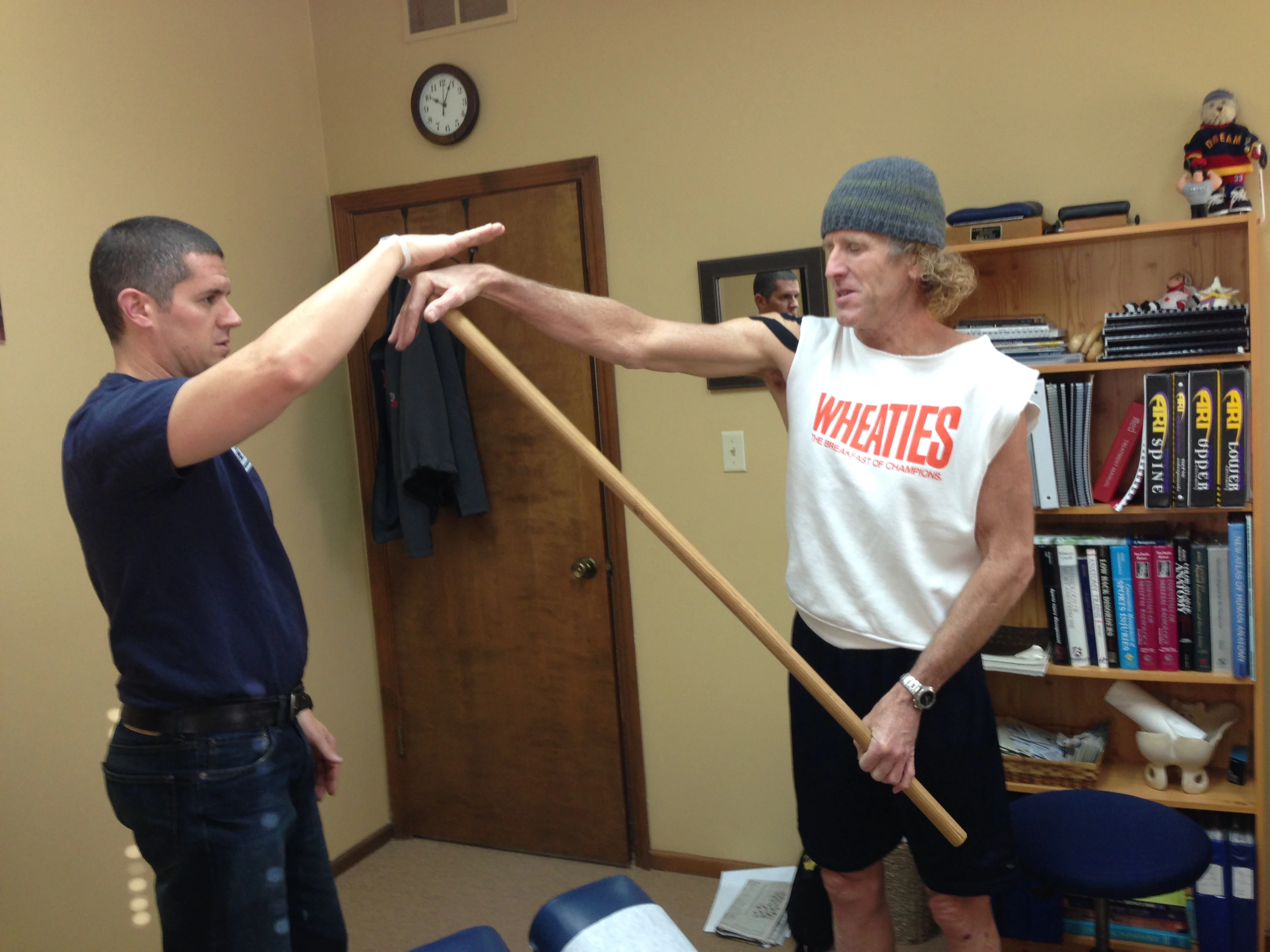 Trying to get stop my muscles from locking up with Rob Jones.