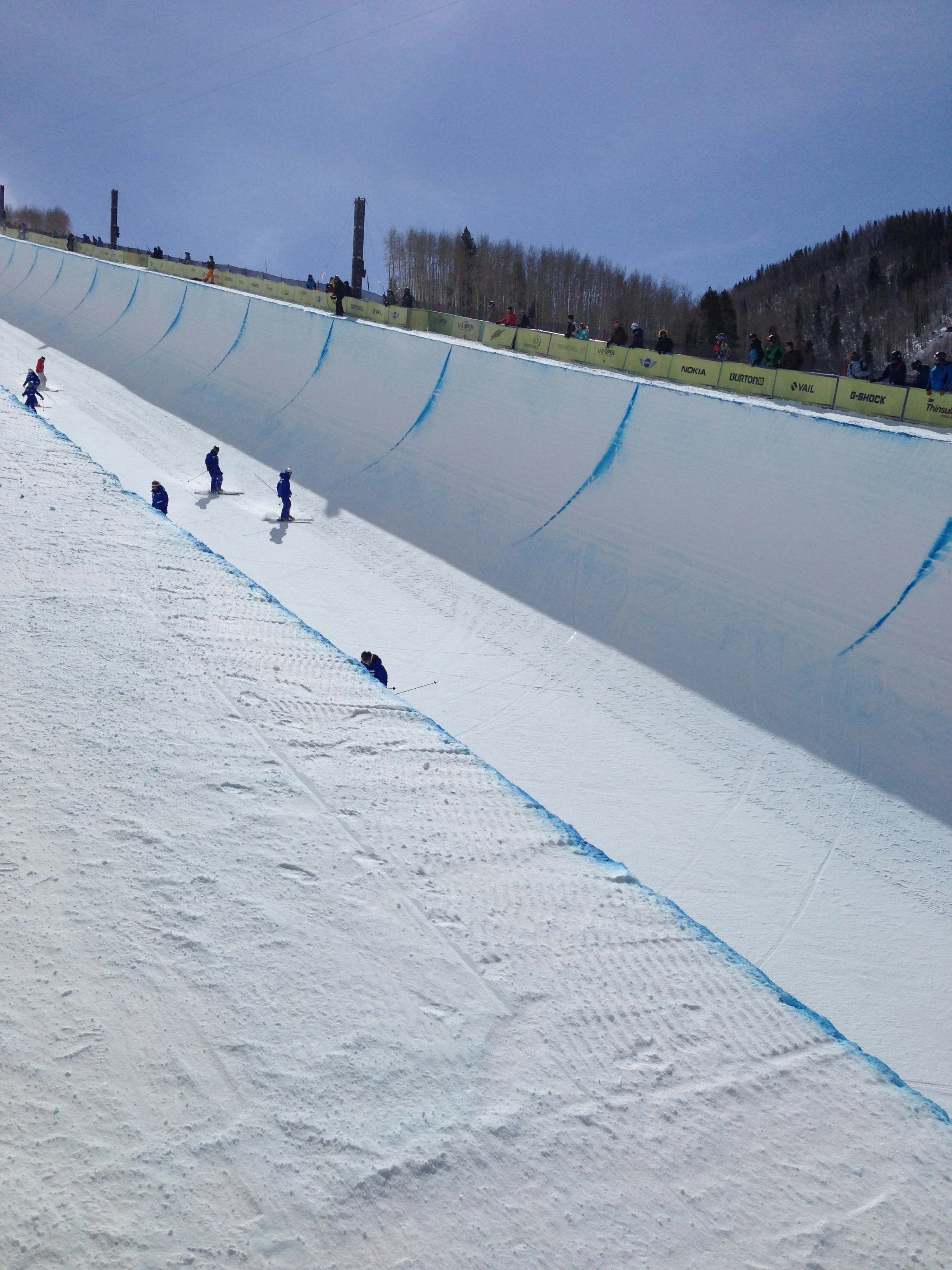 This was between runs. The snow patrol guys go down the pipe to smooth out the ruts. Looks how small they look compared to the structure.