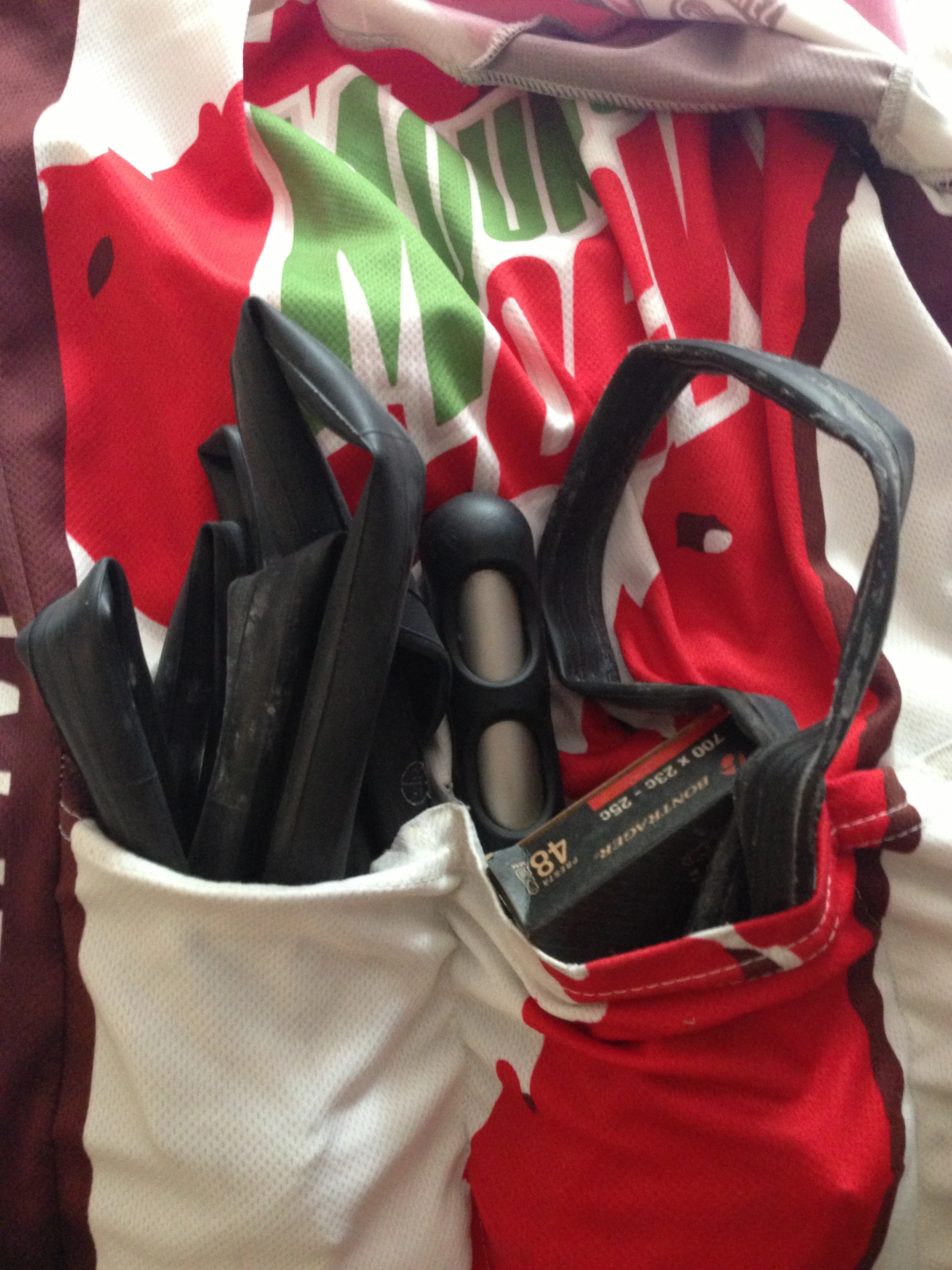 You know it&rsquo;s a shitty ride when your jersey pockets look like this when you get home. Changing tubes is a real challenge with my right shoulder.