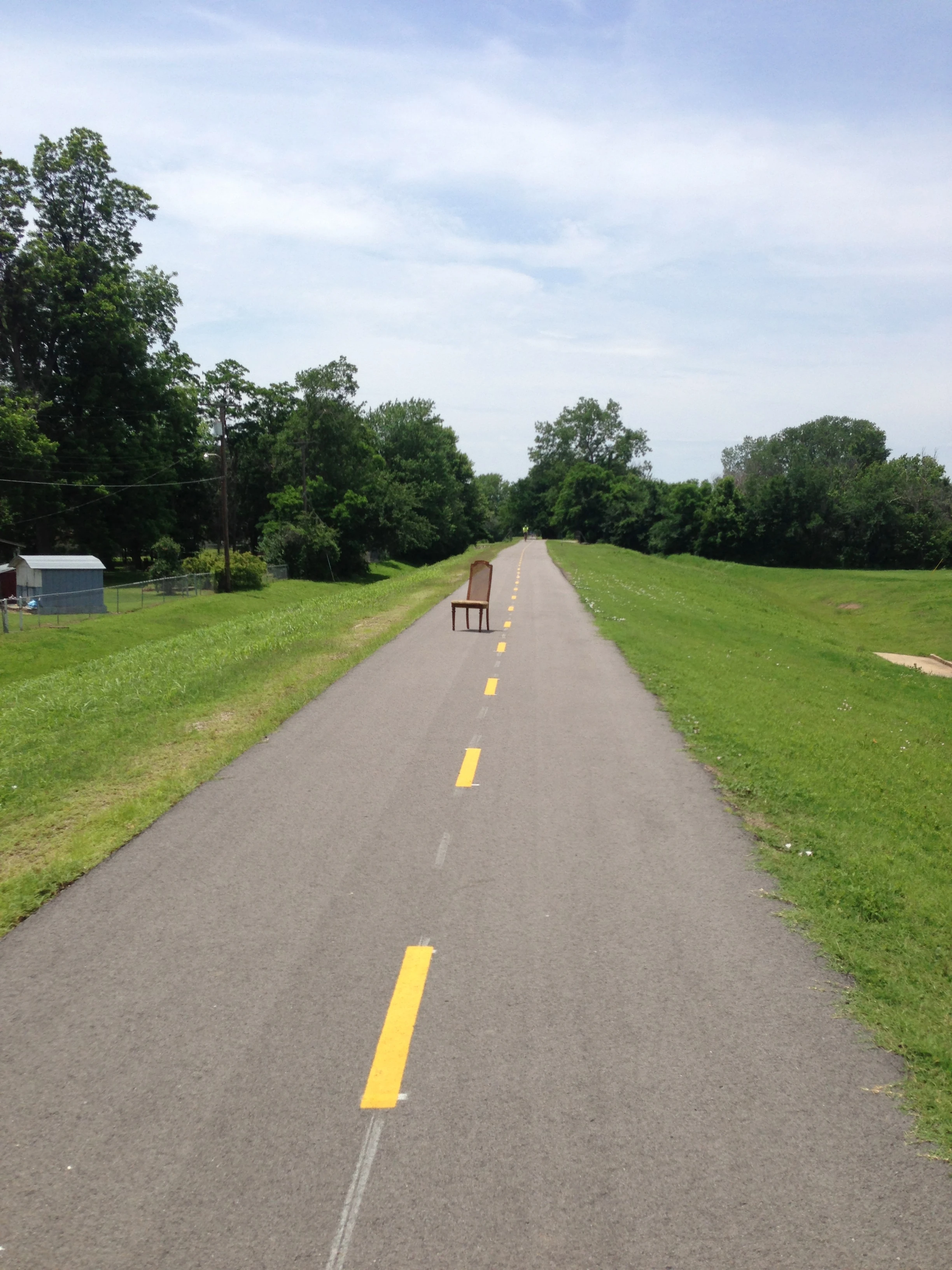 I was riding on a bike path, heading towards Sand Springs and this chair was just sitting there. I&rsquo;m not sure what that was all about.