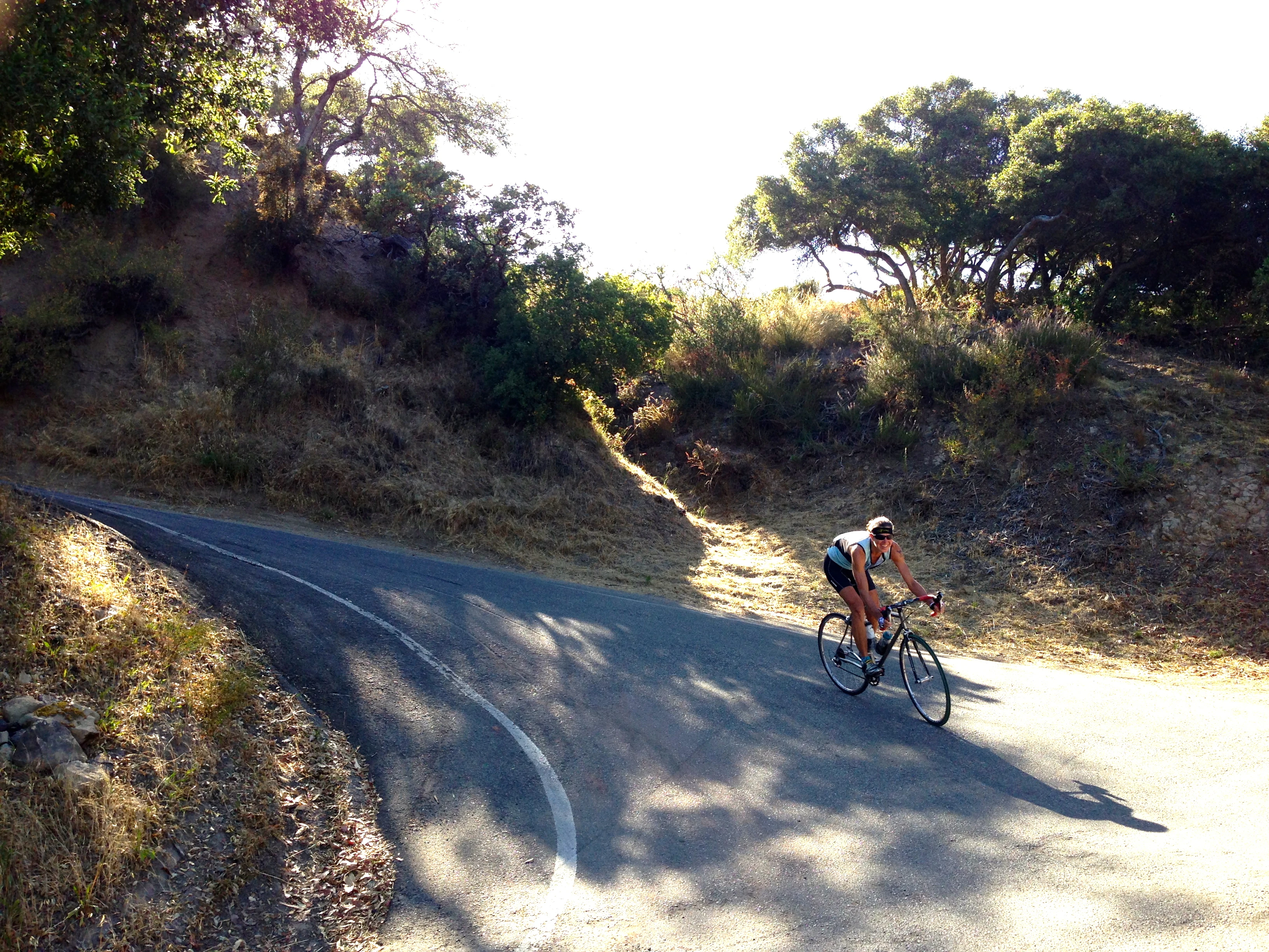 This is Sue taking one of the super steep descent corners on Painted Cave. This has to be 25% or more at least.