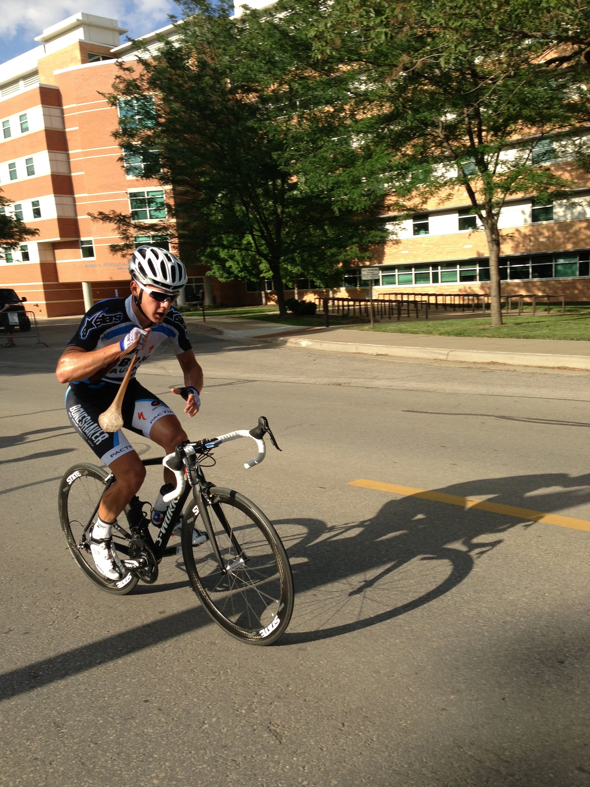 Jospeh riding away alone, getting a hose full of ice.