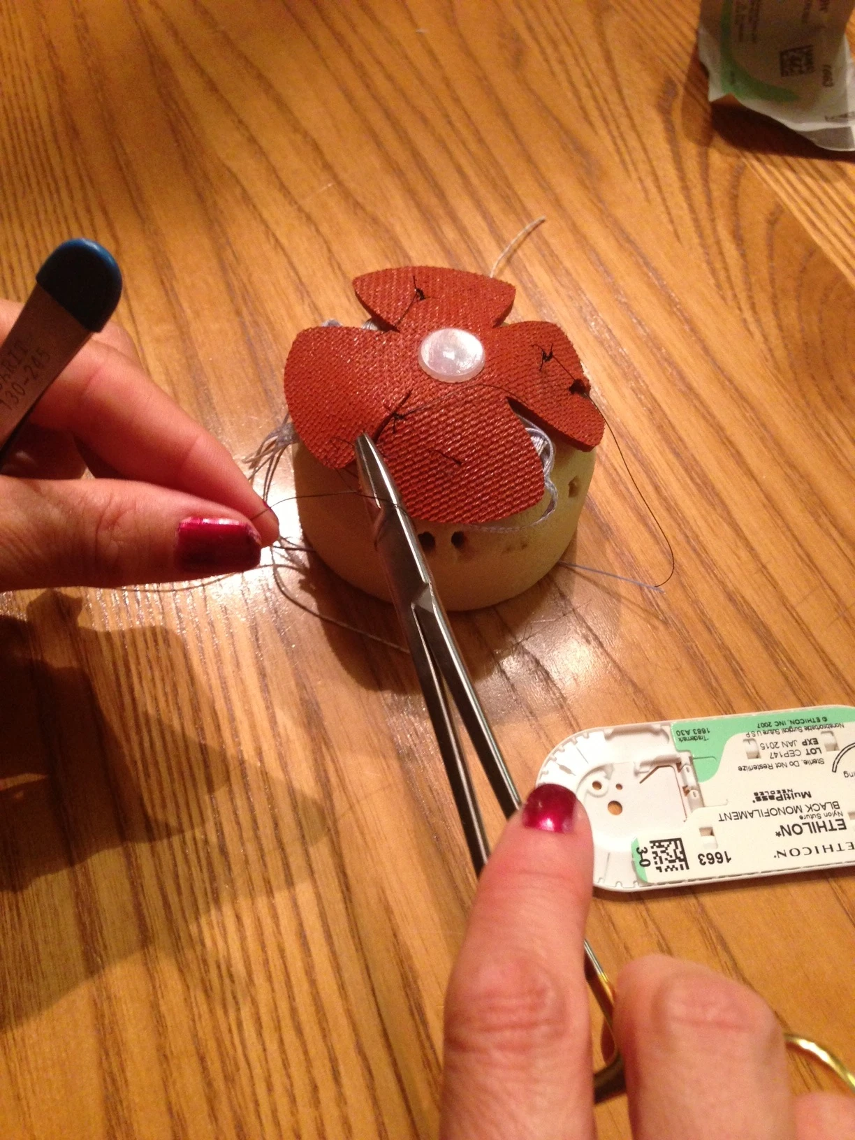 Stacie showing me the right techniques.