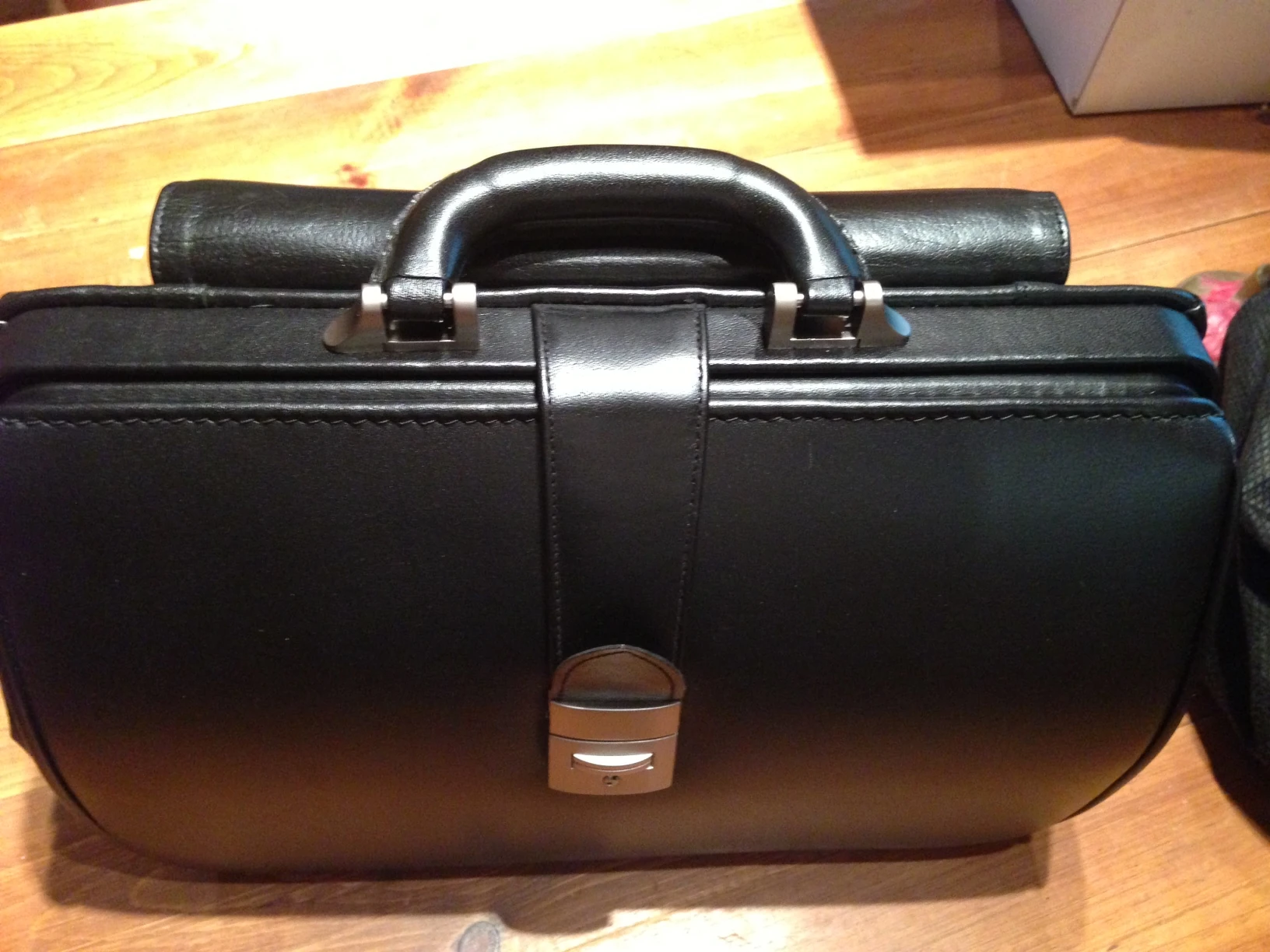 The bag itself is beautiful. Dennis said woman should carry it as a purse.