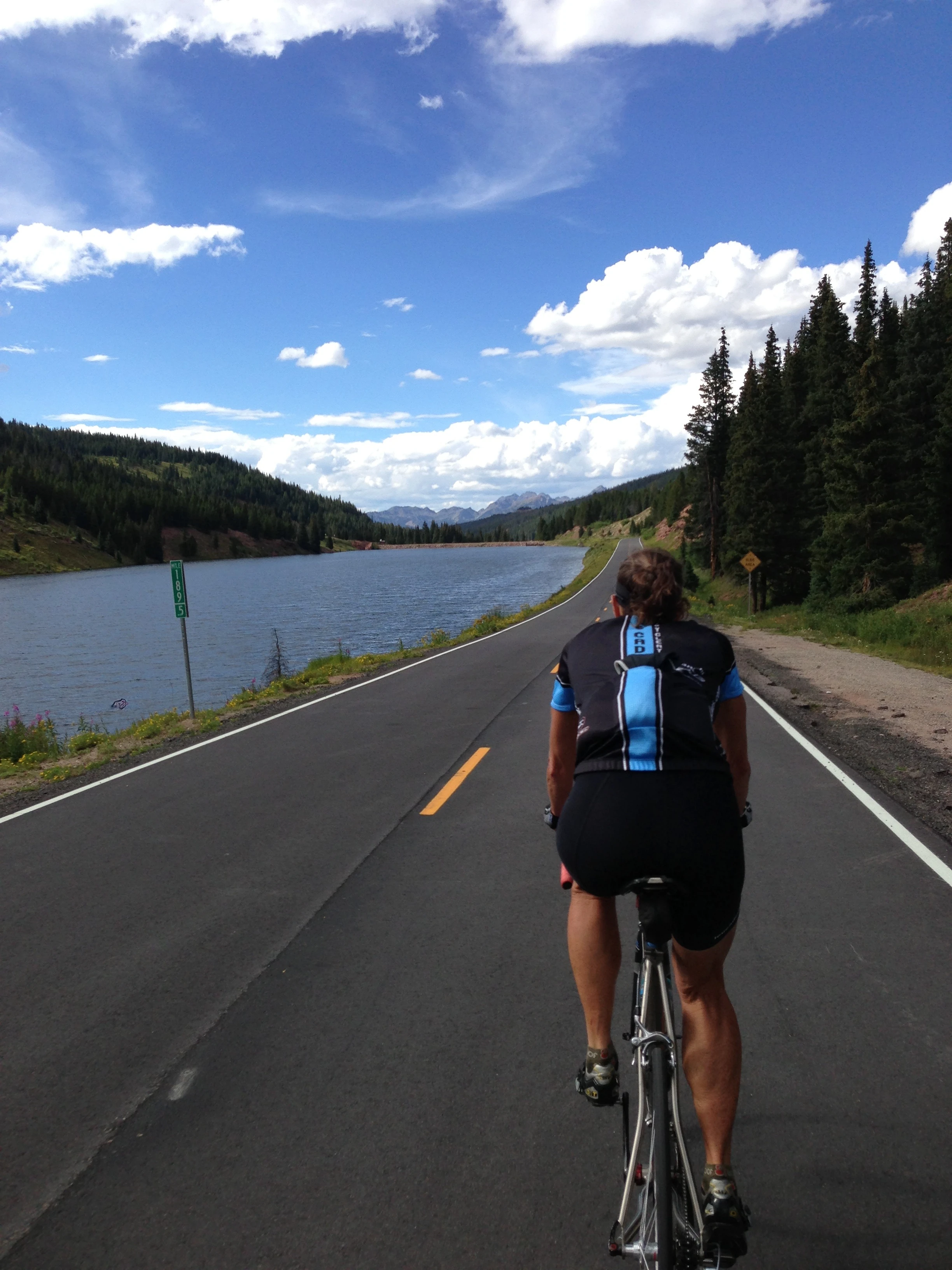 Sue riding back towards Vail near the top of Vail Pass.