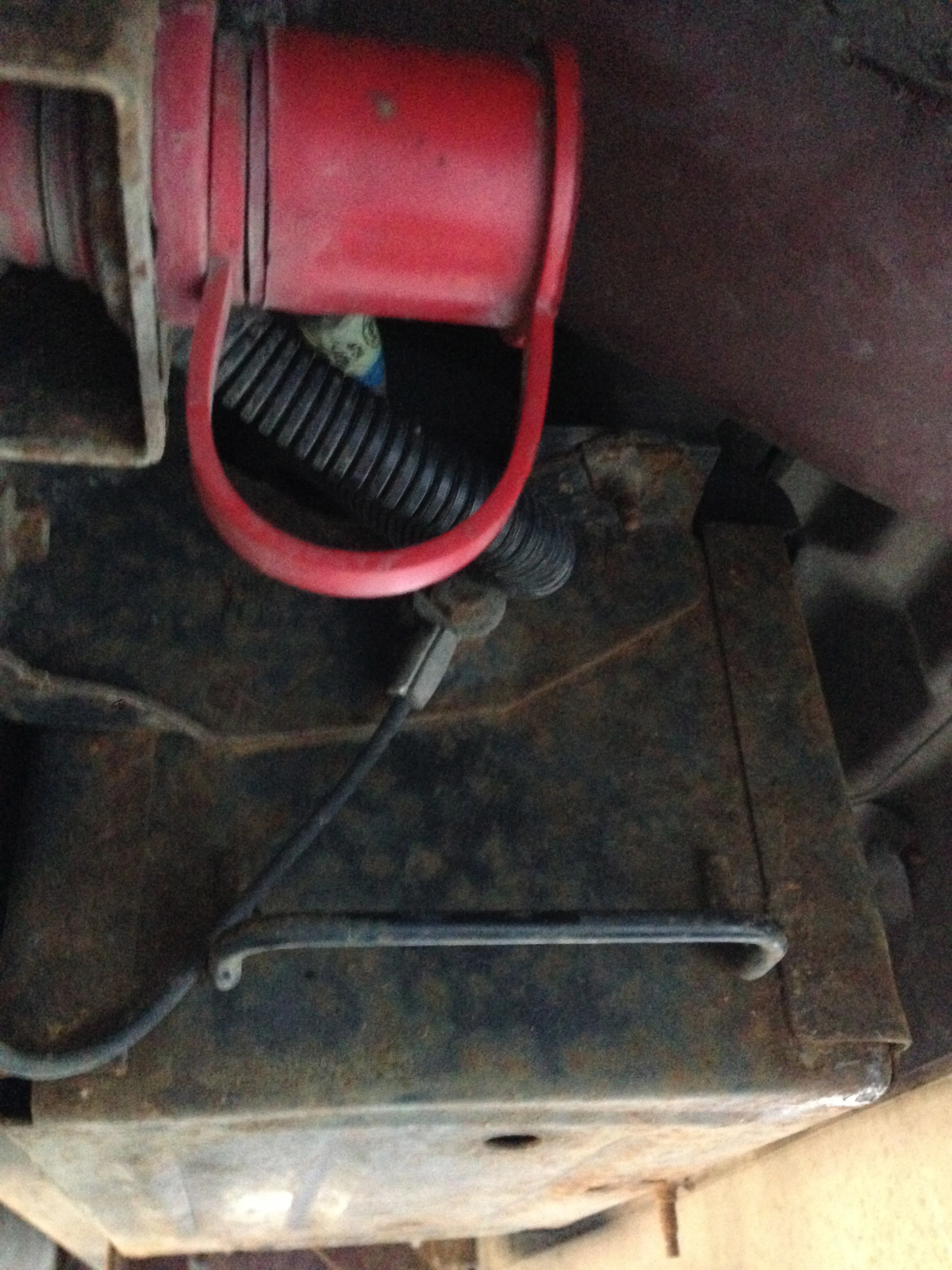 The batteries are in these boxes that are mounting up on the floor, mid way back.