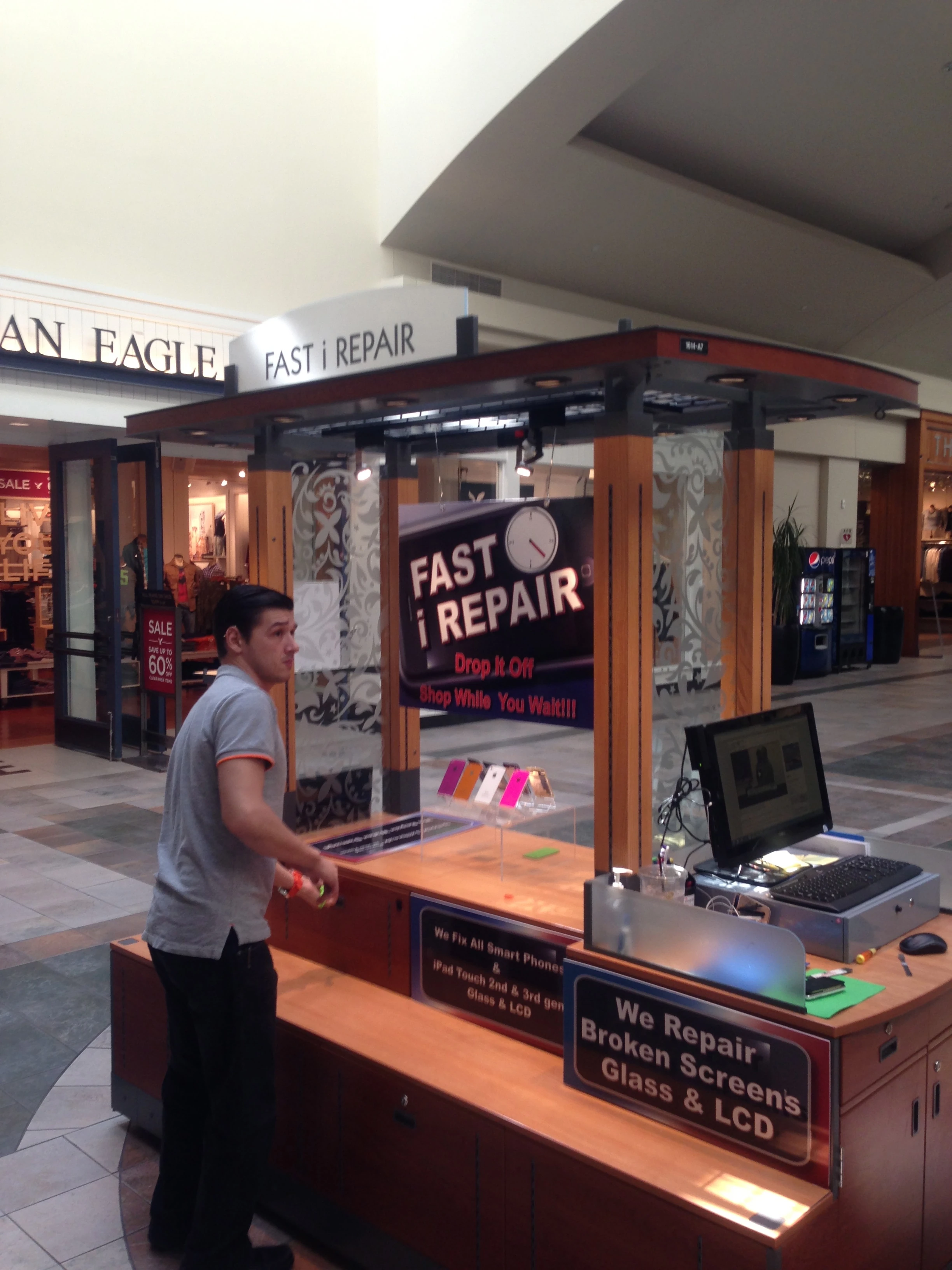 My iPhone was messed up and I went to the Apple Store here and they gave me a new phone. This guy was set up in the mall to fix broken screens etc. Pretty great idea.