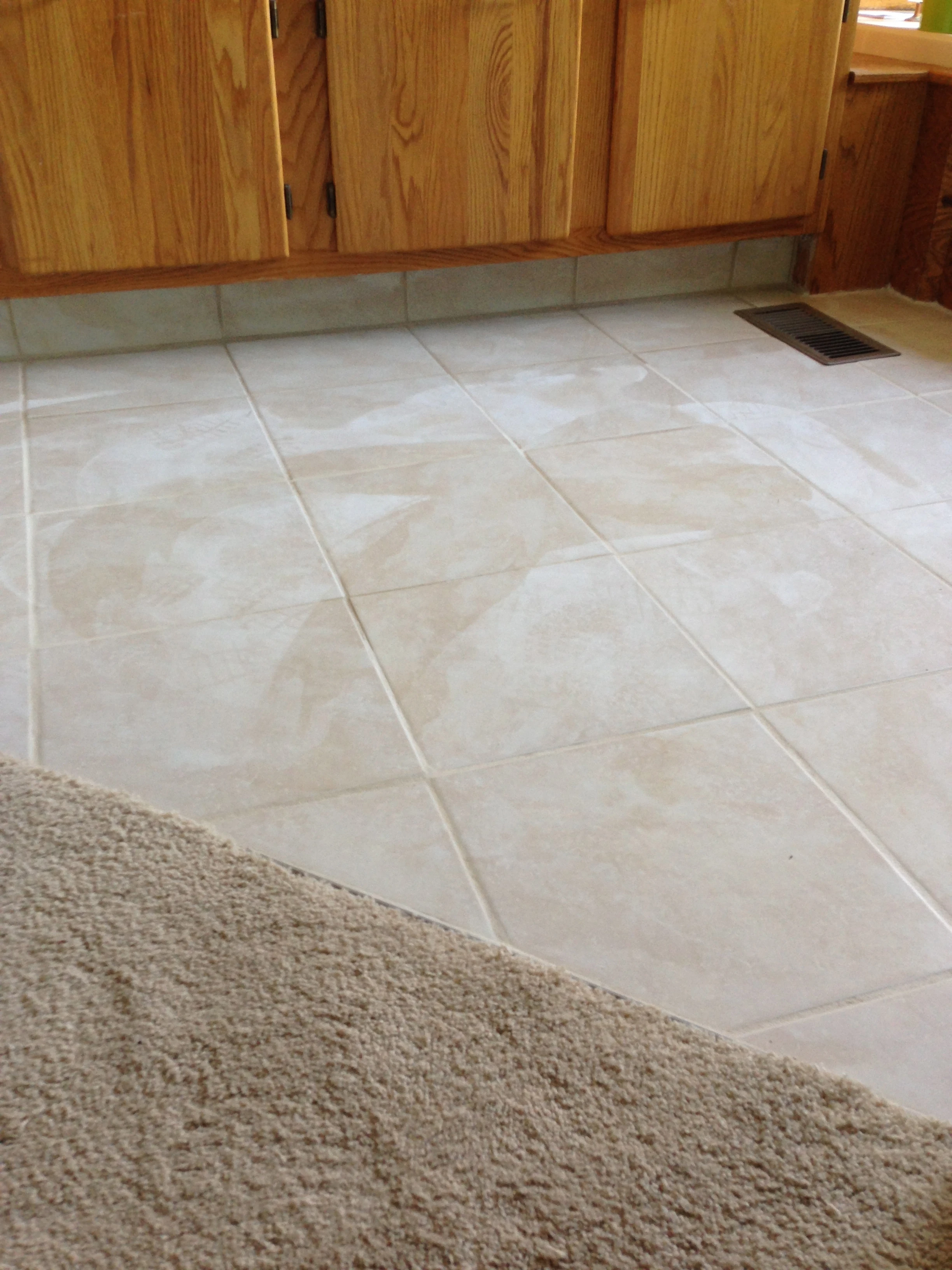 Finished floor, with a little grout haze.