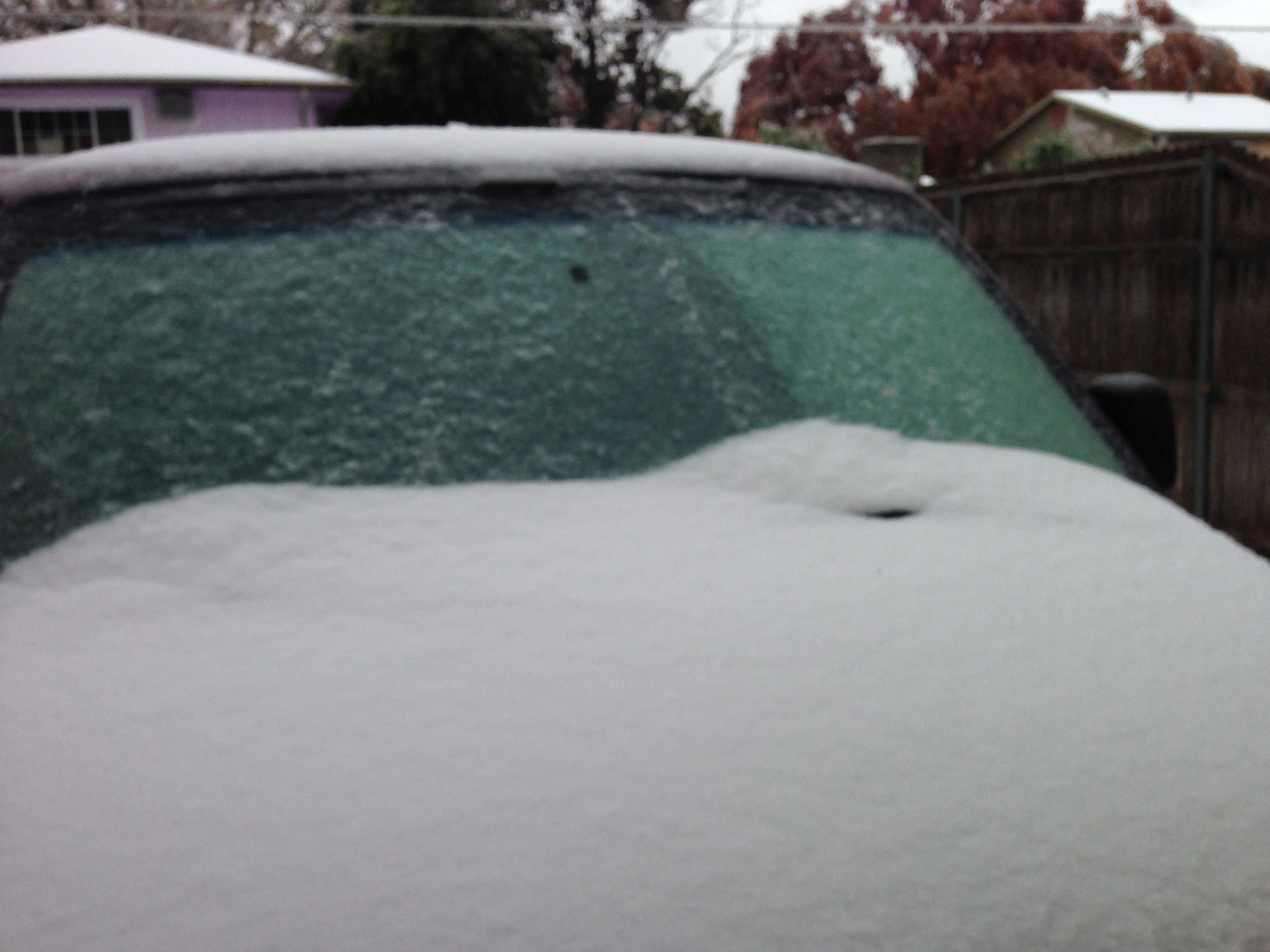 It took quite a while to get this frozen mass off the front of my van.
