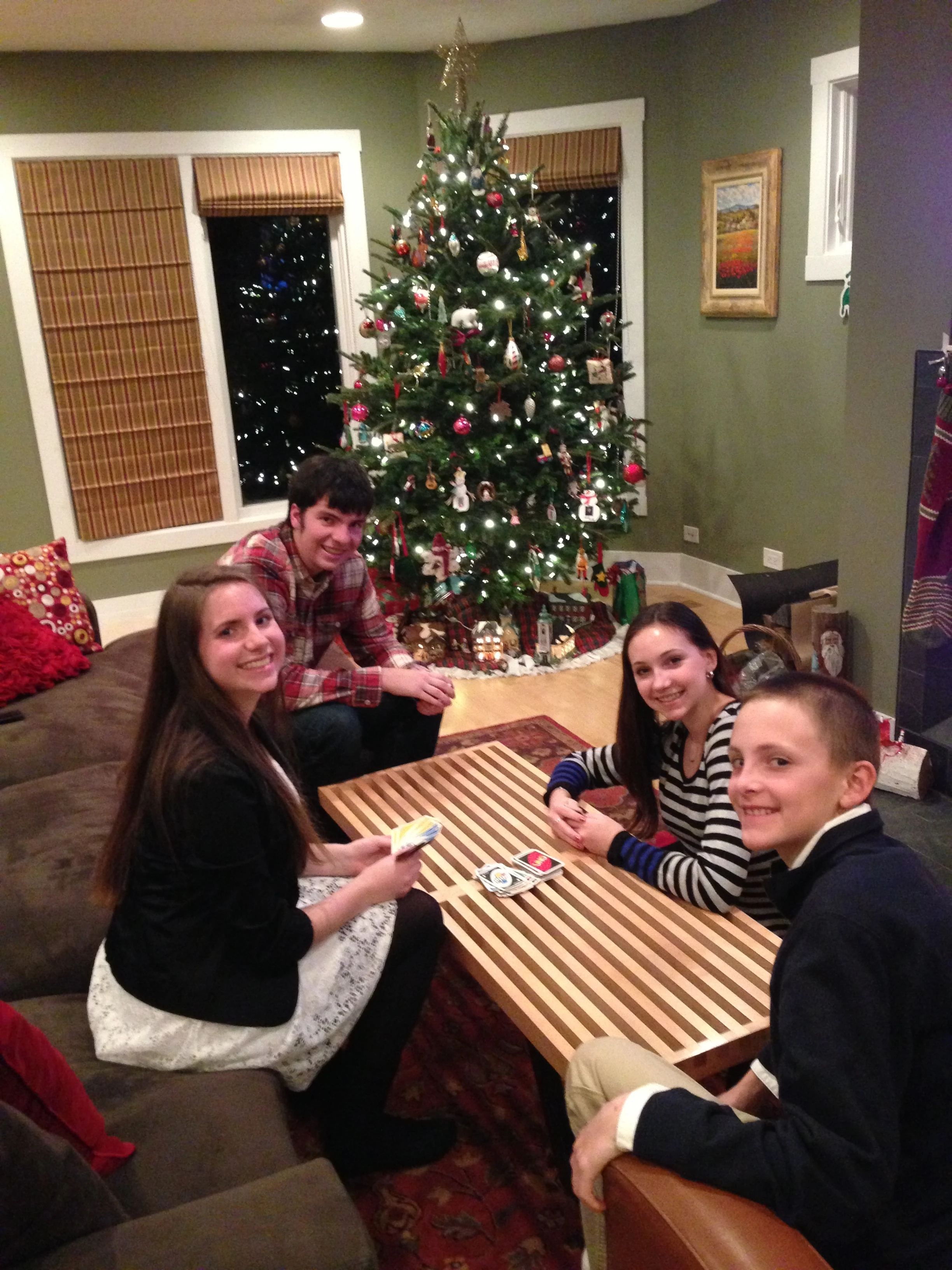 Her nieces and nephews. Hannah, Parker, Madeline and Alec. At the kid&rsquo;s table. Seems like they might have out grown it.