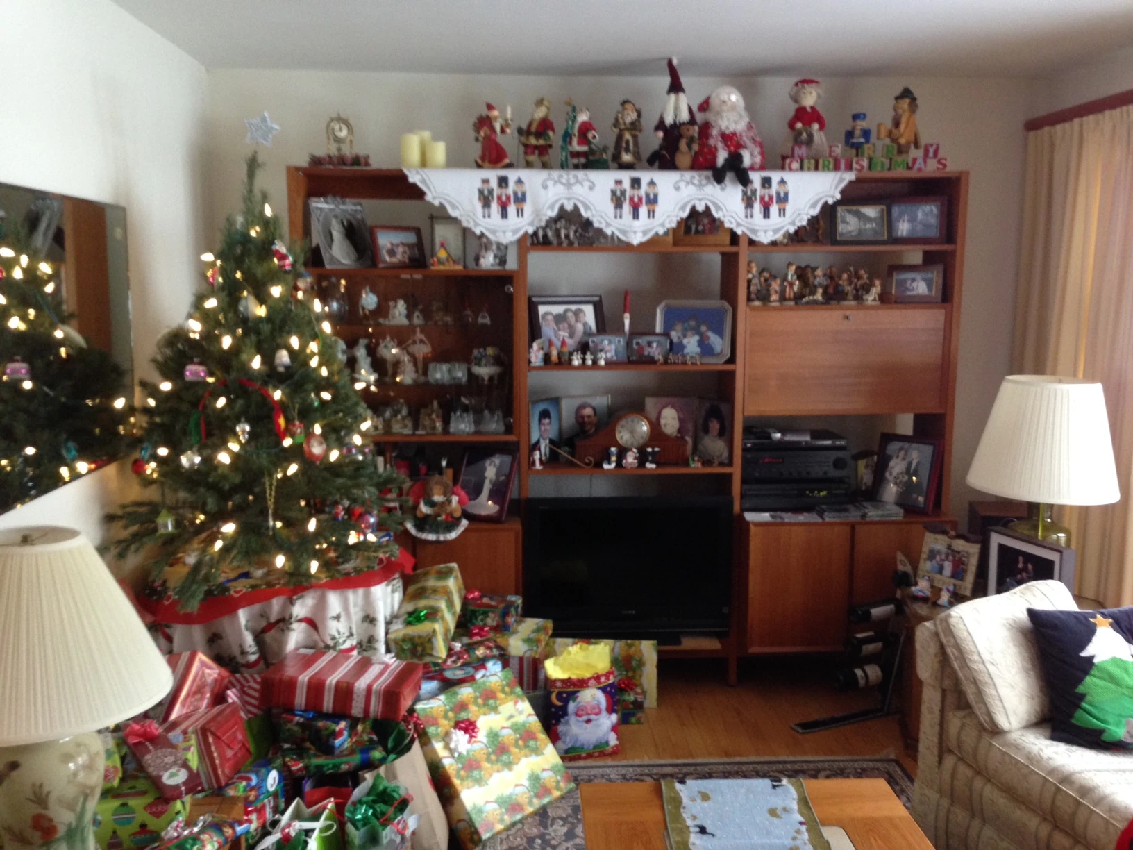 The living room is pretty jammed during Christmas.