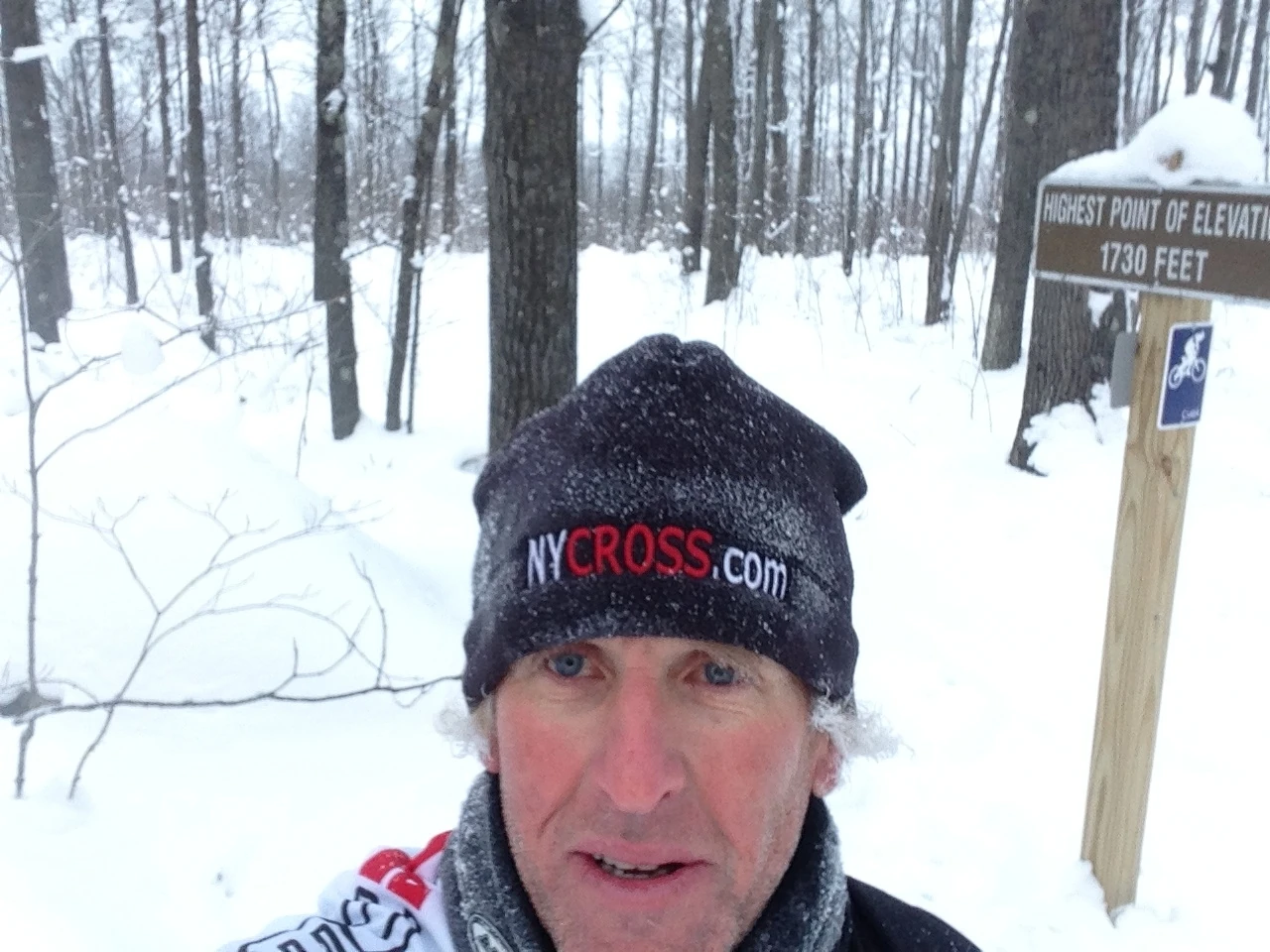 You can’t really see it that well, but over my shoulder, opposite of the sign is a rock covered with snow. That is what I consider Harold’s rock, I put his ashes there. I have a little personal conversation with him each time I ski over the hill.