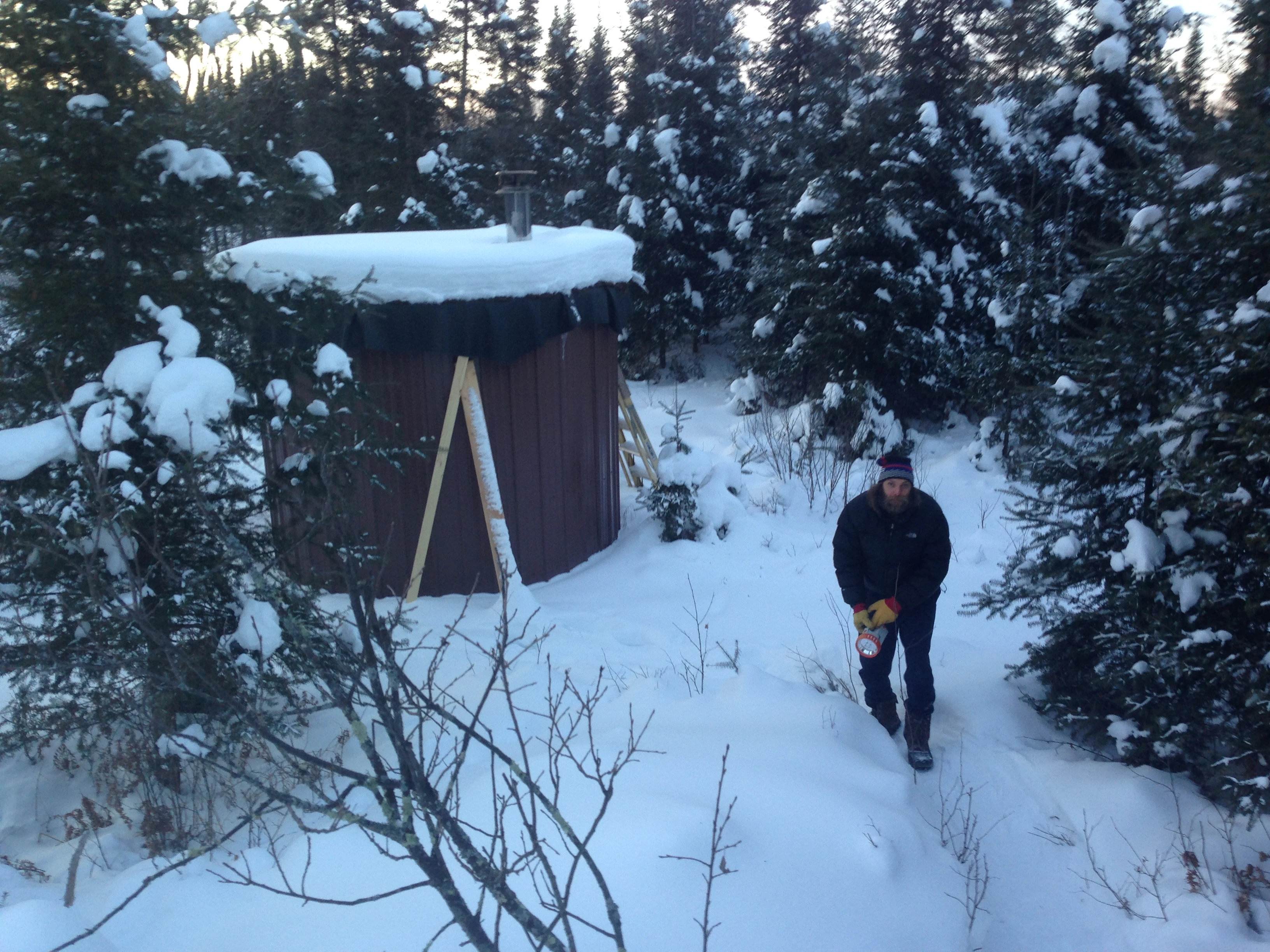 The sauna is a few hundred meters away. It is wood heated. It was super hot, like over 200 degree +++ hot. It was great going out into the snow after roasting. It was pretty strange, standing nude in the woods at close to -20 degrees and feeling pretty warm.
