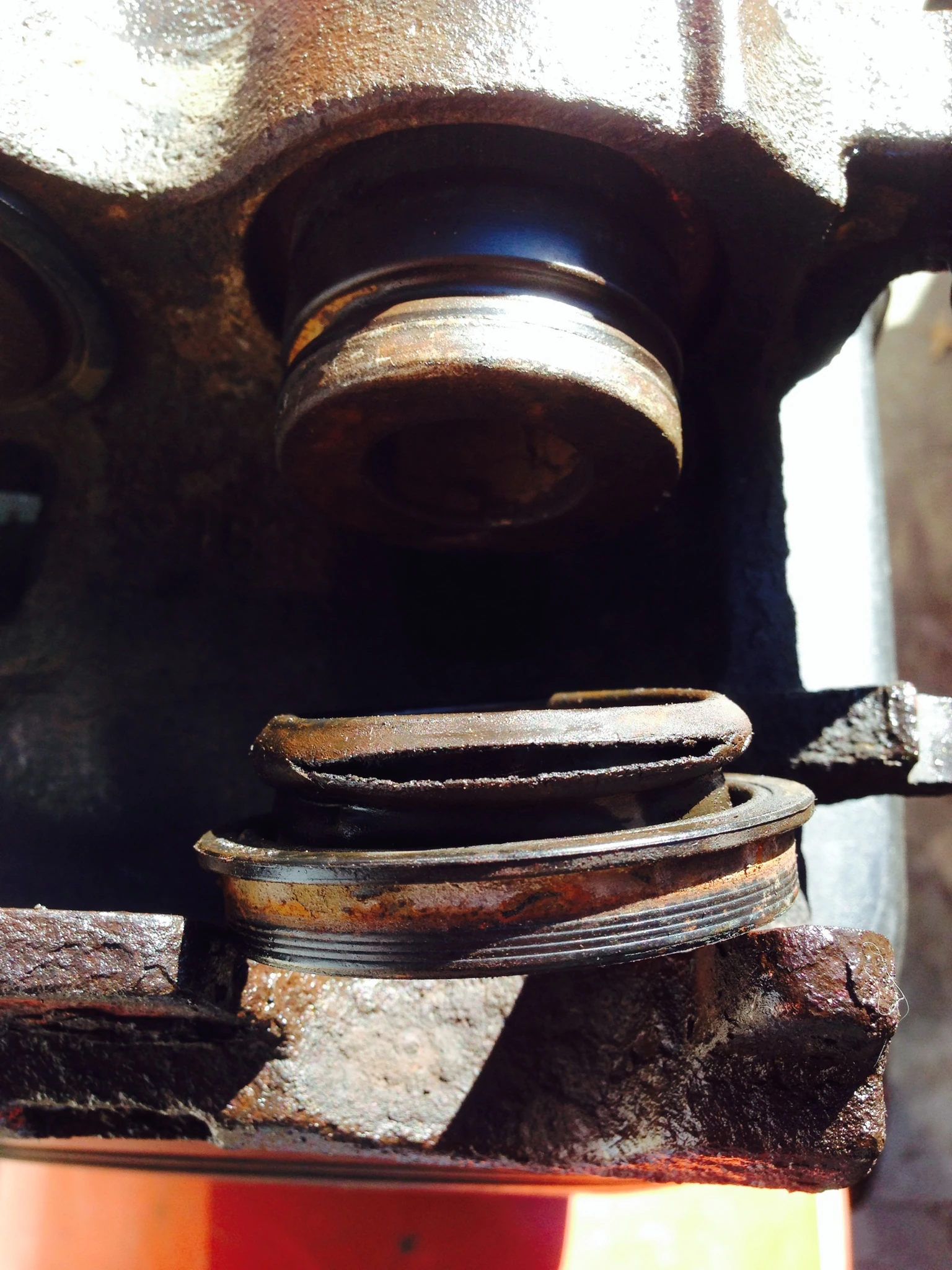 Old caliper and worn out seal.