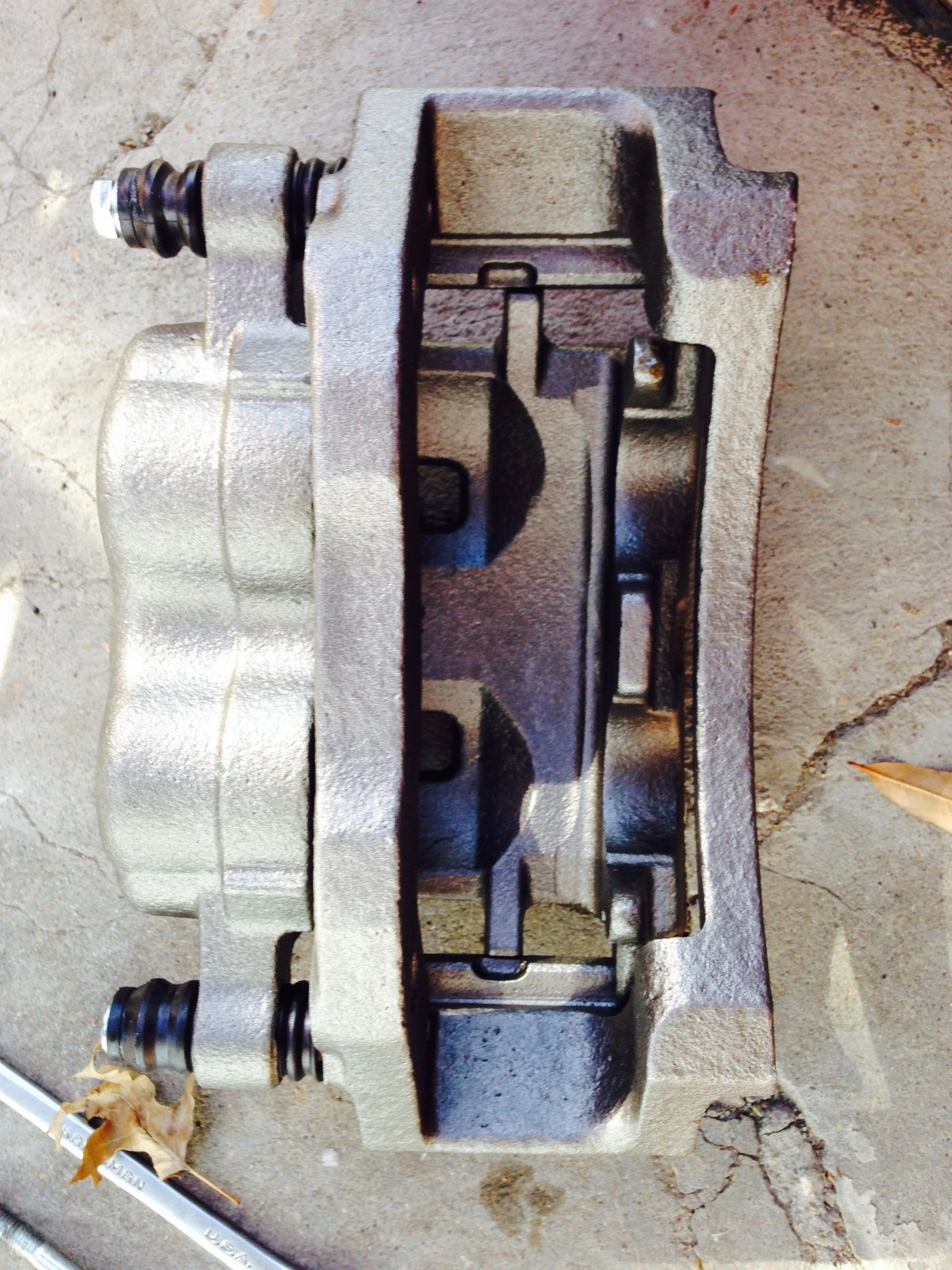 New/rebuilt caliper.