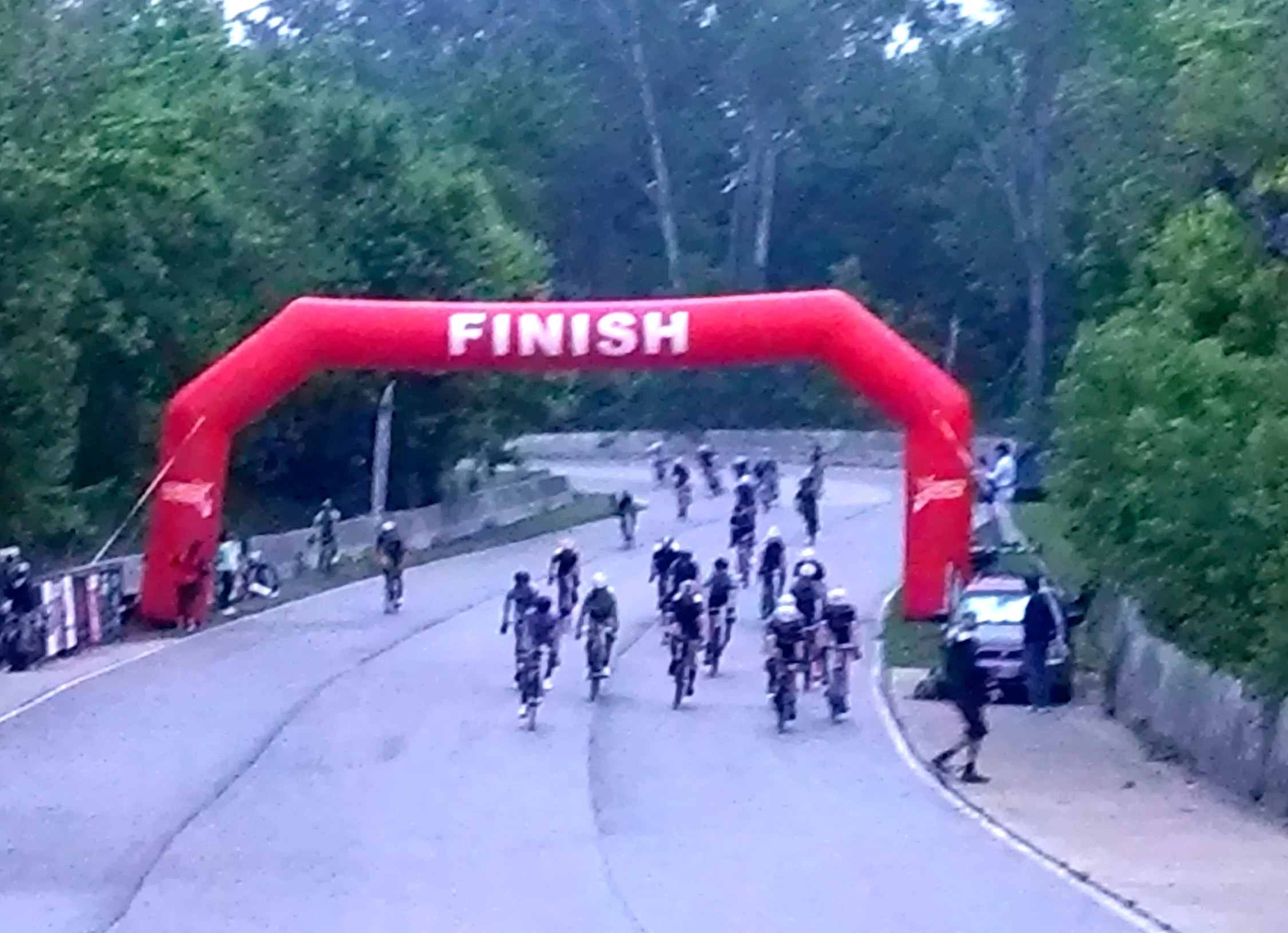 FInish sprint photo. The line was 10 feet before the banner. I&rsquo;m in the middle about 5th, in the white helmet.