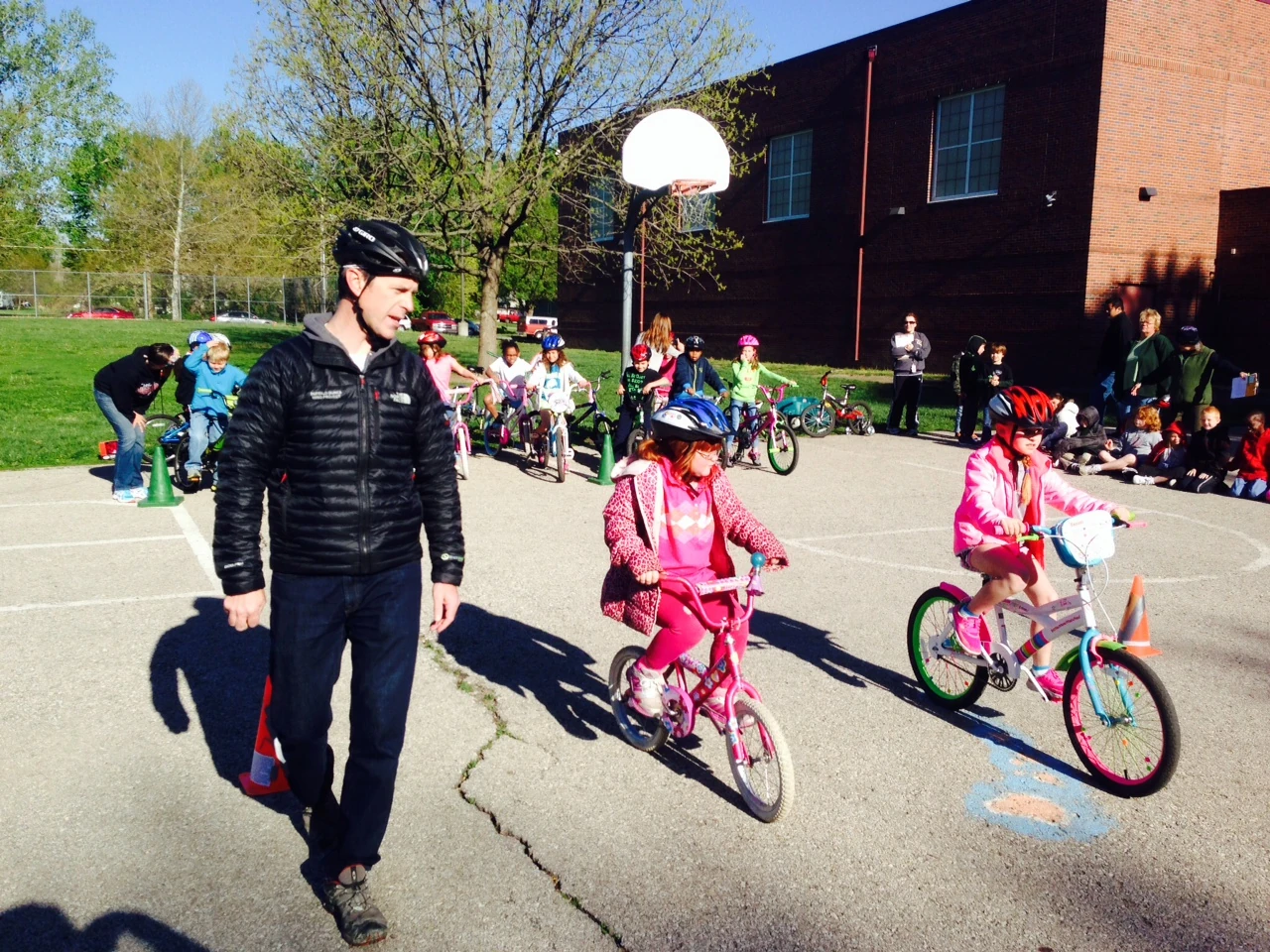 Matt Gilhousen, Czar of TradeWind, walking some little ones through the obstacle course.