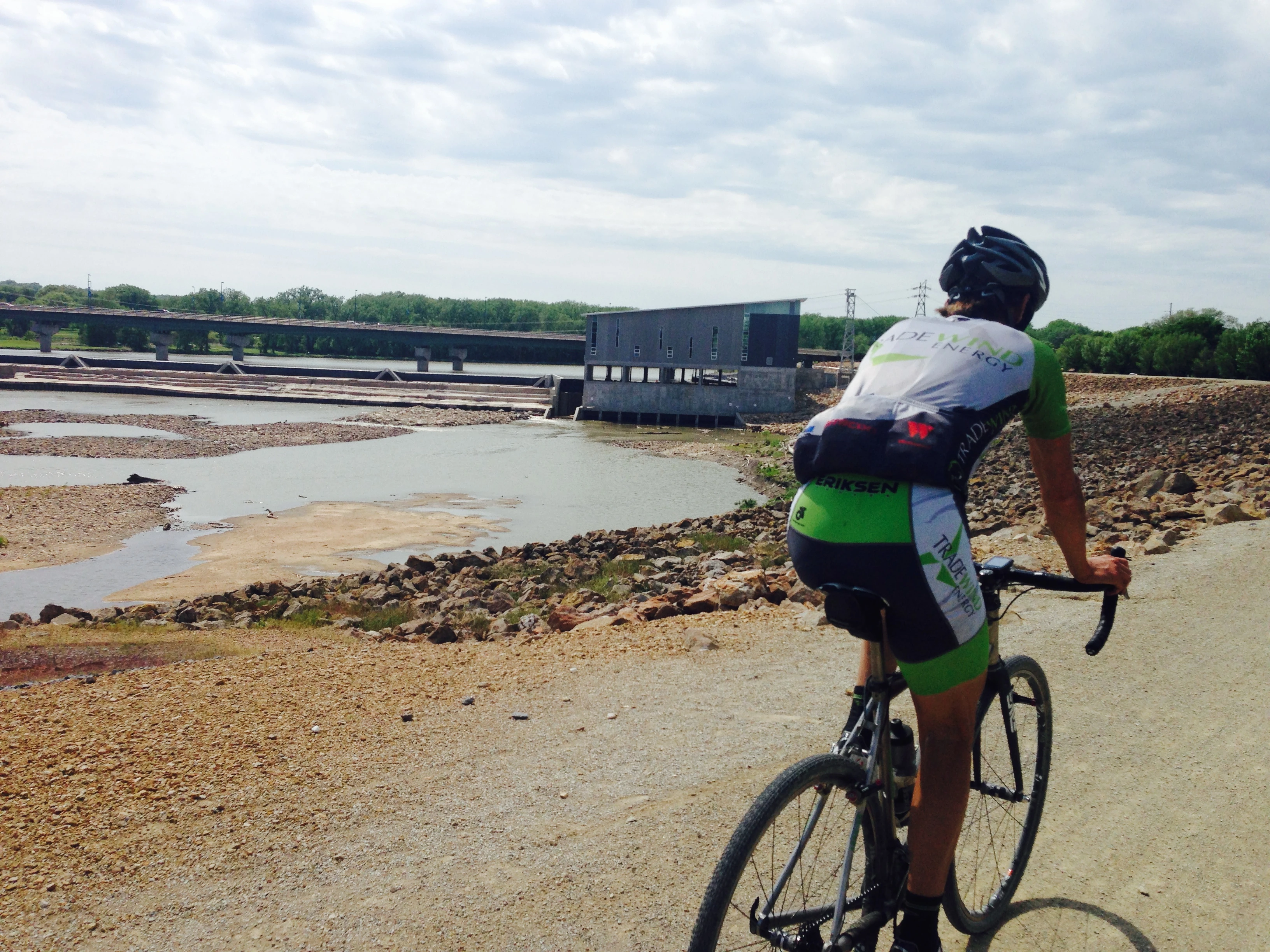 Brian riding into Lawrence on the levee. They are building a new hydro electrical plant there now.