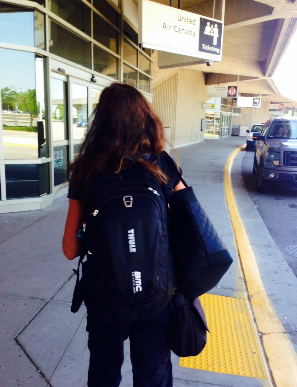 Trudi heading into the airport as I was heading out.