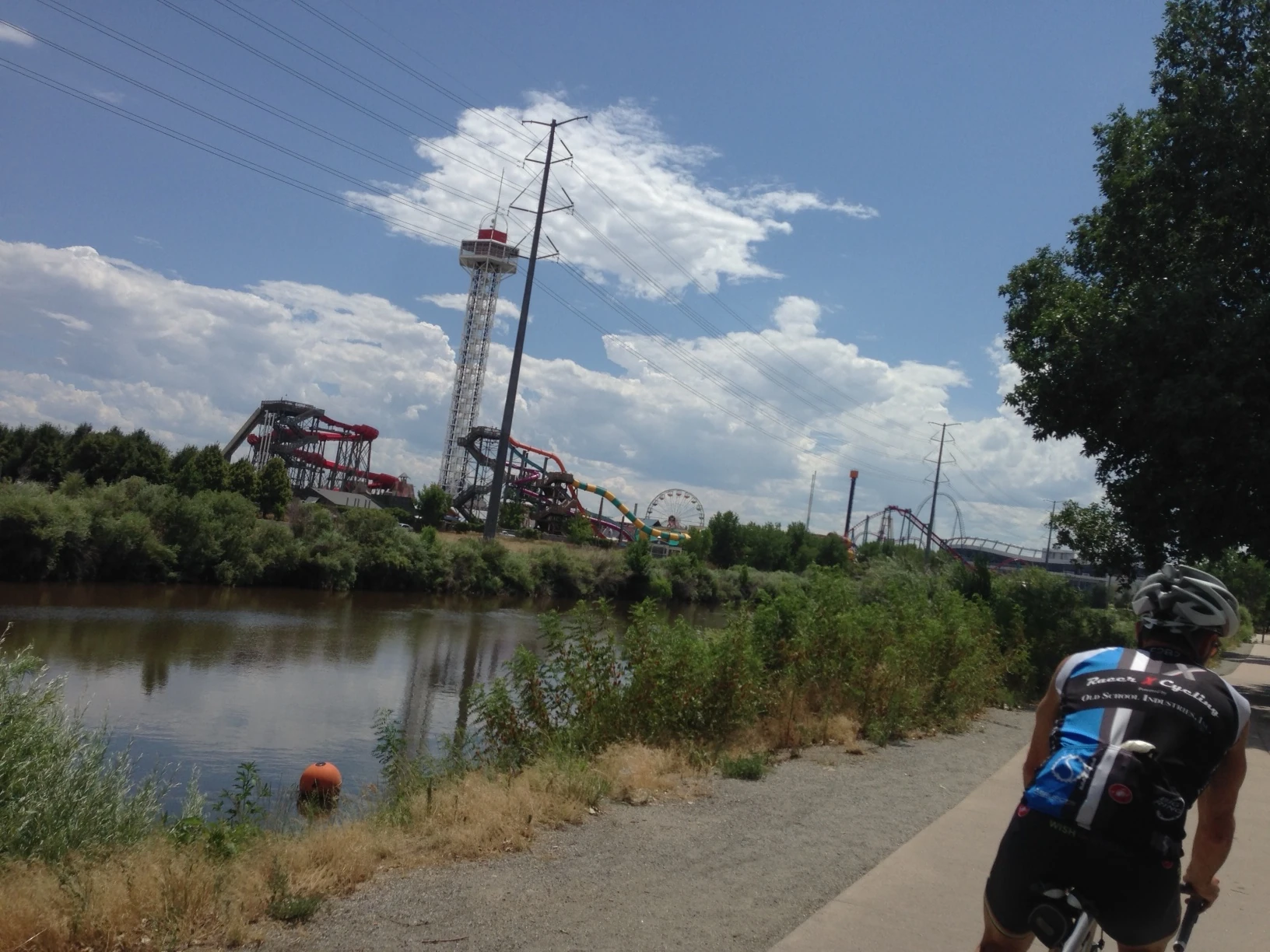 Bike path by an amusement park somewhere near downtown Denver.