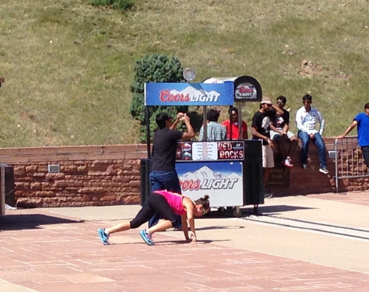 There were so many people doing some sort of boot camp at Red Rocks. This woman was creeping along on her hand and feet.
