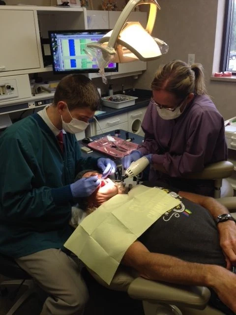 Dr. Gilmer working on me.