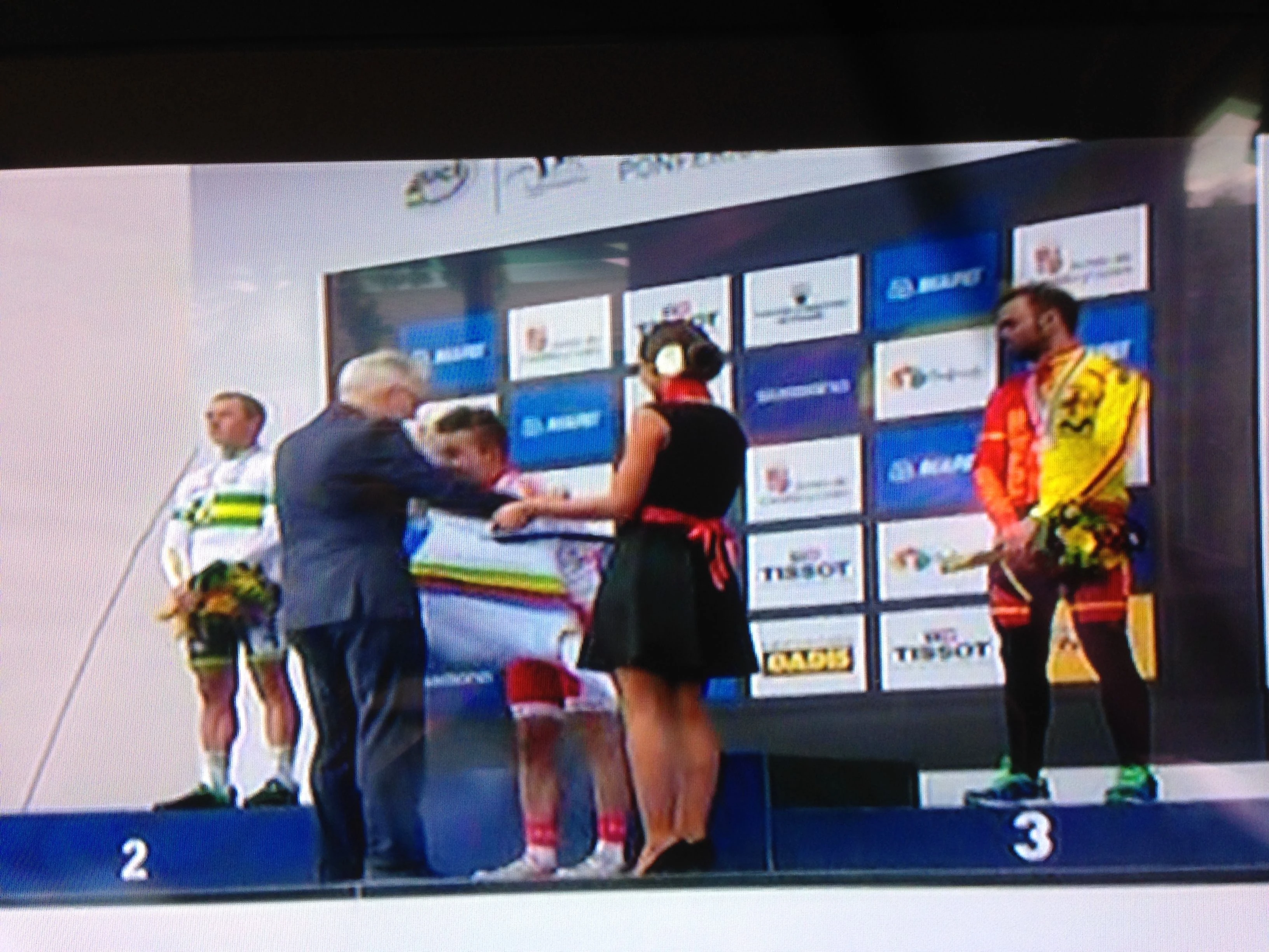 Universal Sports sure jacked up the end of their coverage, not showing the final podium. This is the only shot of the jersey presentation. Kind of anticlimatical. 