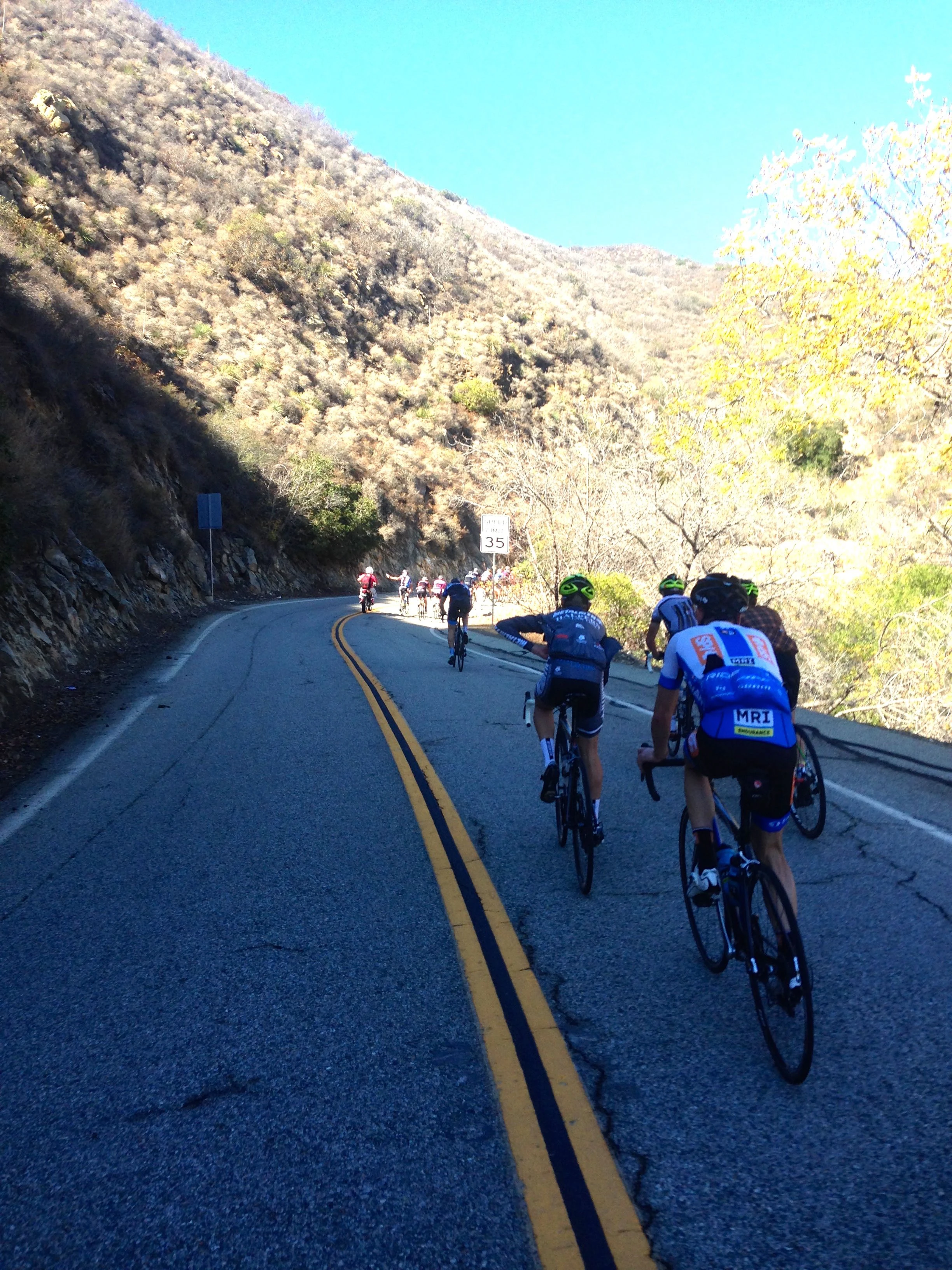 This is when I caught back on at the bottom of the Mullholland Climb. Jimmy Mac is on his motorcycle leap frogging us to shoot pictures.