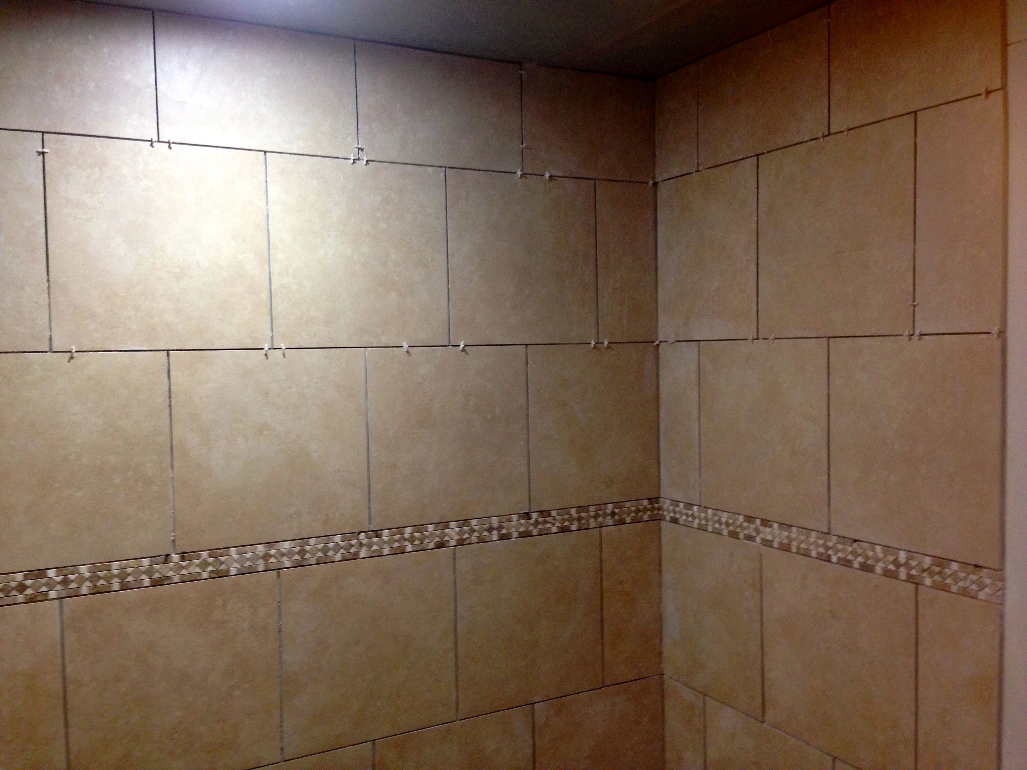 I&rsquo;ve never used 18 inch tile on walls. It looks pretty good. The shower is huge, with nearly 9 foot ceilings. 