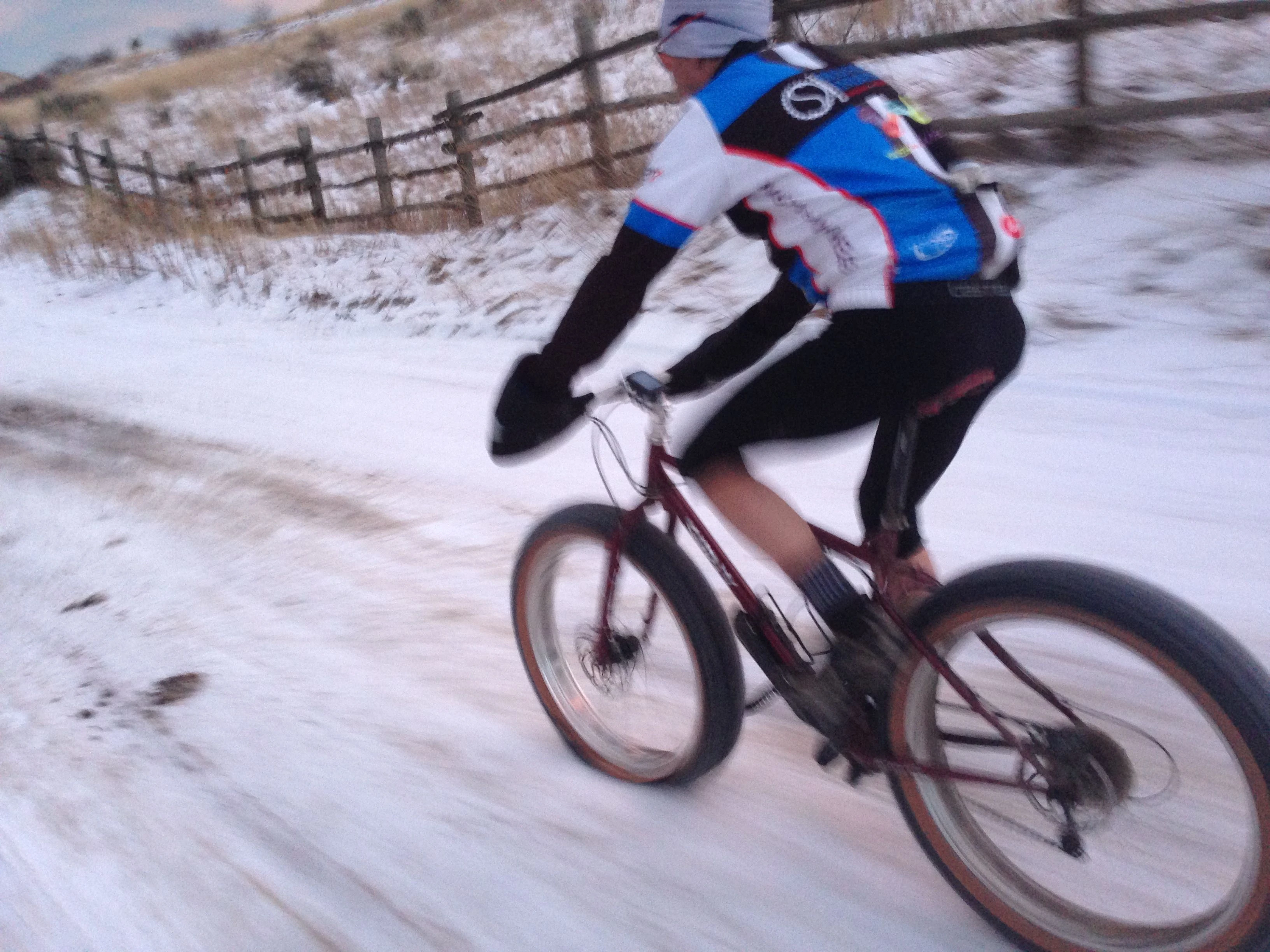 Vincent riding back on a flat front.