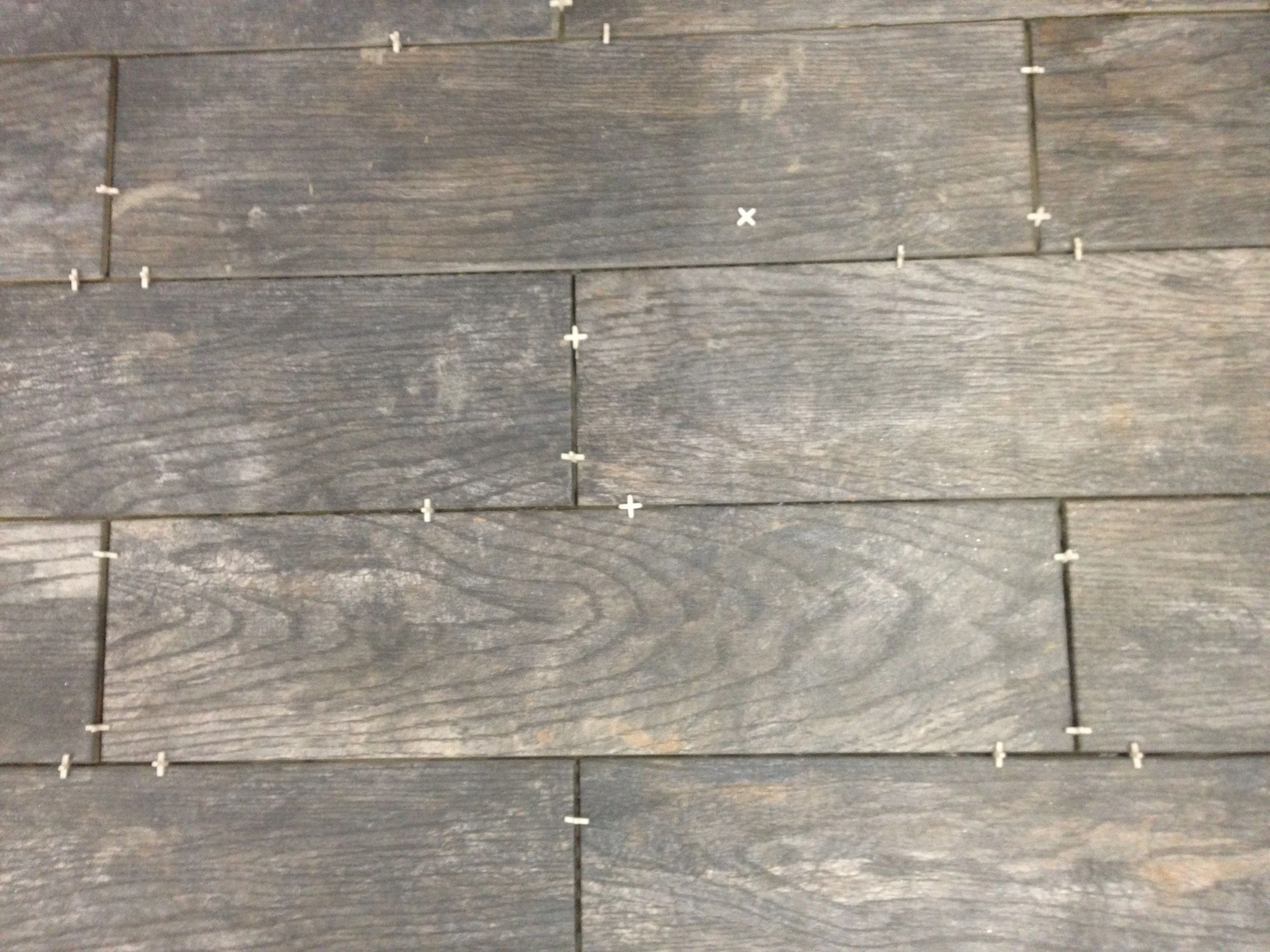 I don’t use tile spacers so much on floors, but Vincent wanted super thin grout lines and it would be easy to get off pattern with each of us working sort of indepently.