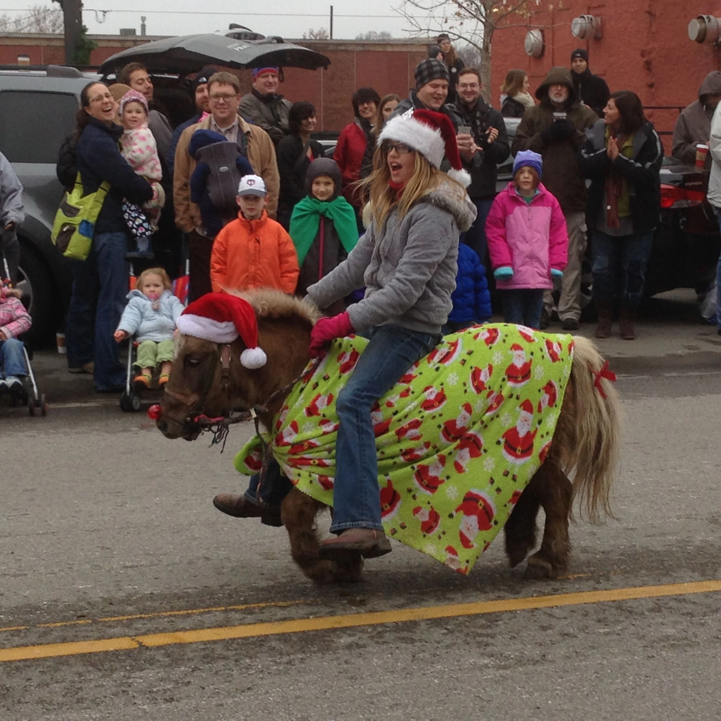 Little horse with a bigger girl.