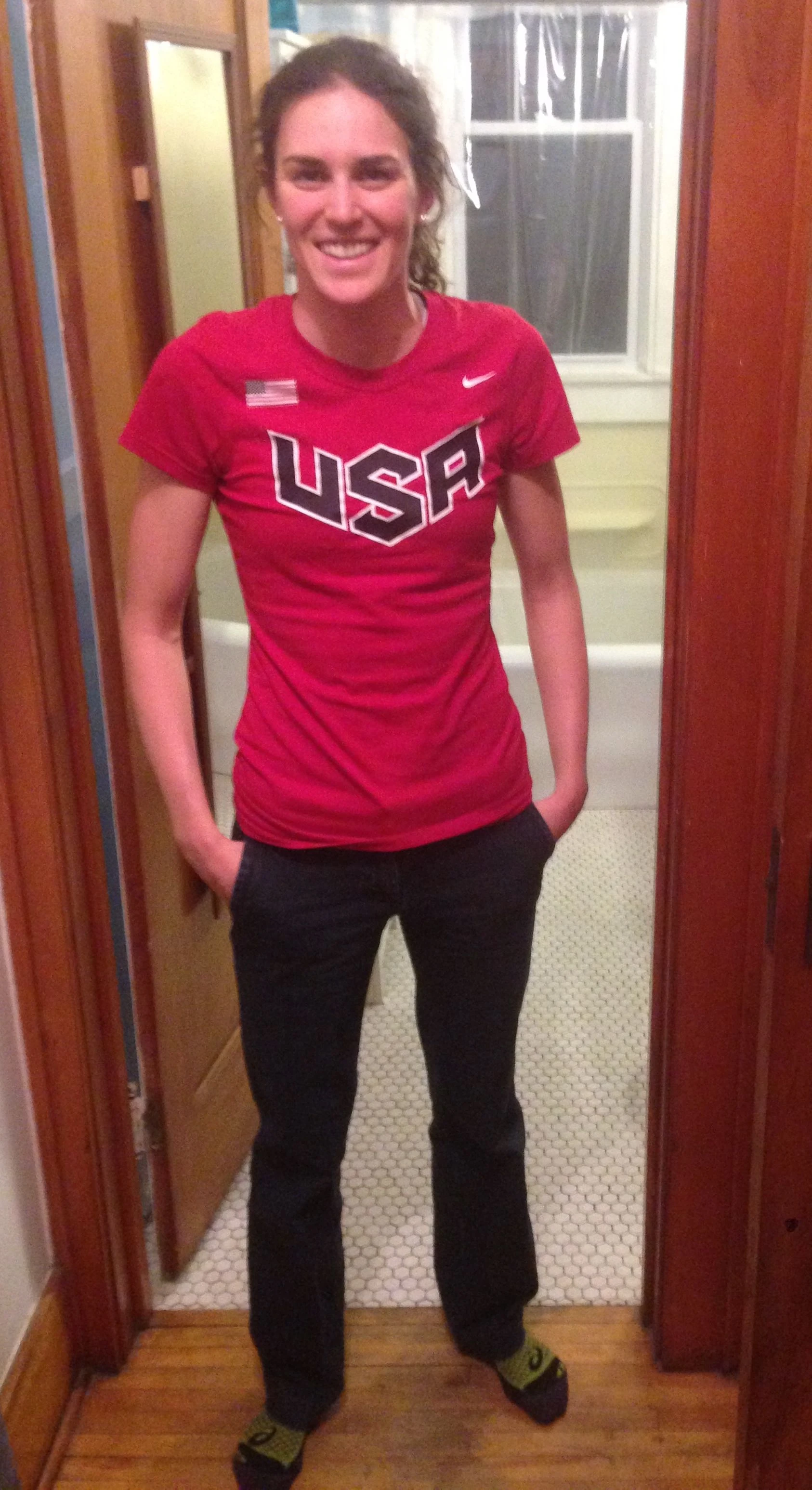 Gwen modeling in front of the future bathroom remodel.