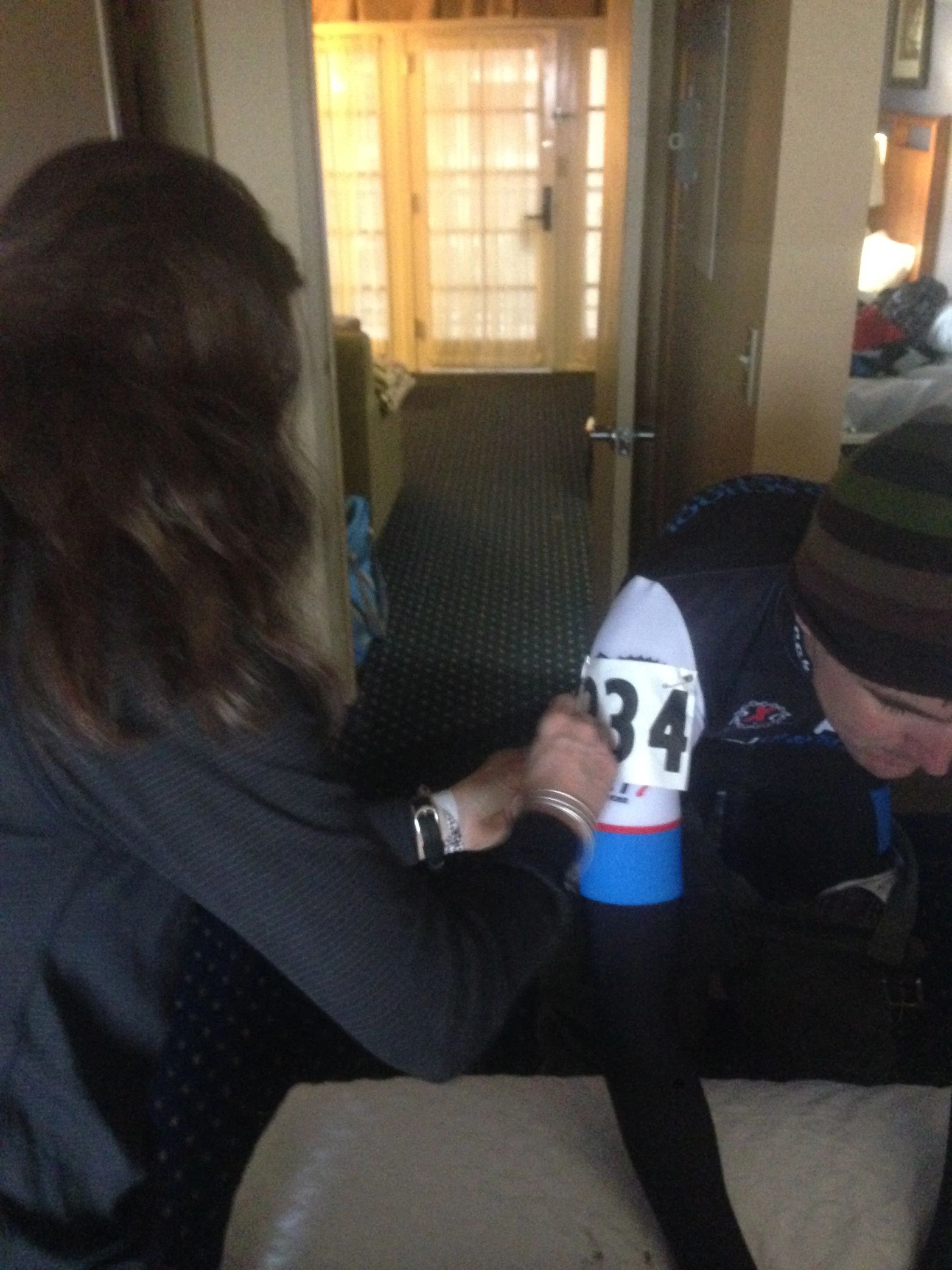 Trudi pinning on Vincent&rsquo;s numbers this morning.