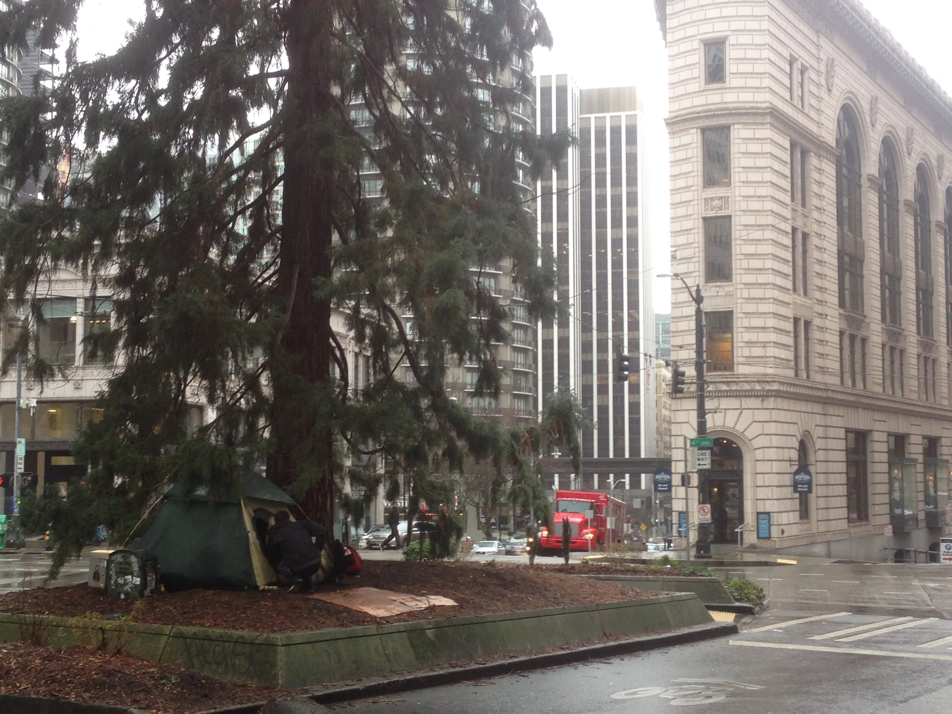 Before that, we did a 7 miles walk around town. I didn&rsquo;t start Strava on my phone until have way in and had 3.something miles. This guy had his tent set up really in the middle of the street. The building behind the tree is super cool.