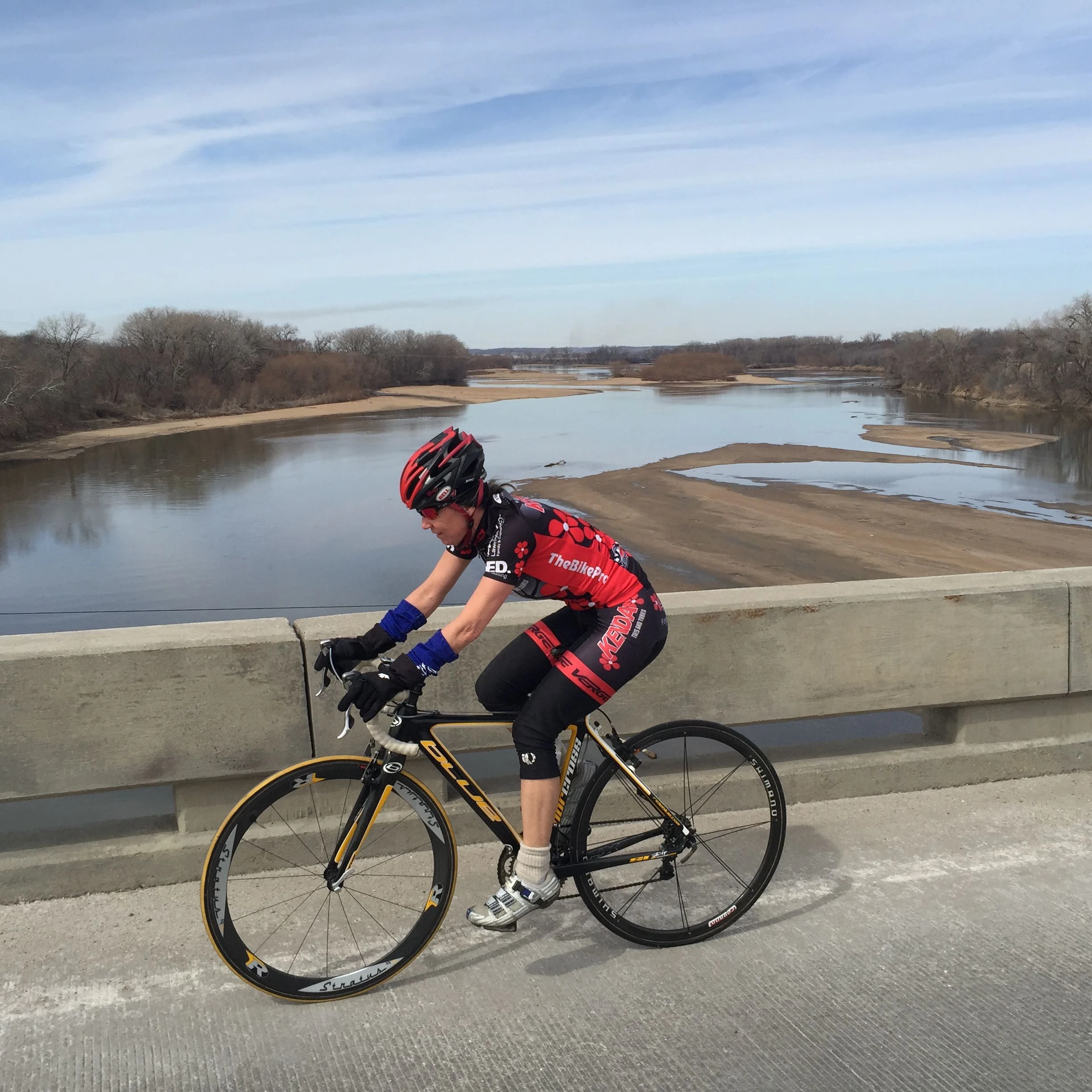 Catherine riding over the Kansas River. It is super low.