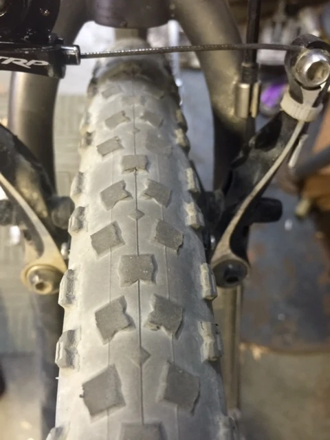 Mine are just worn enough that they should be pretty bald by the end of 100 miles on thick gravel.