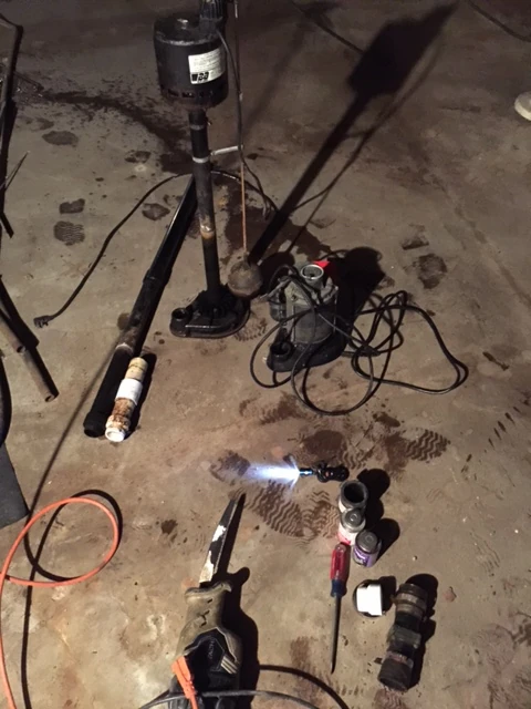 Exchanging sump pumps.