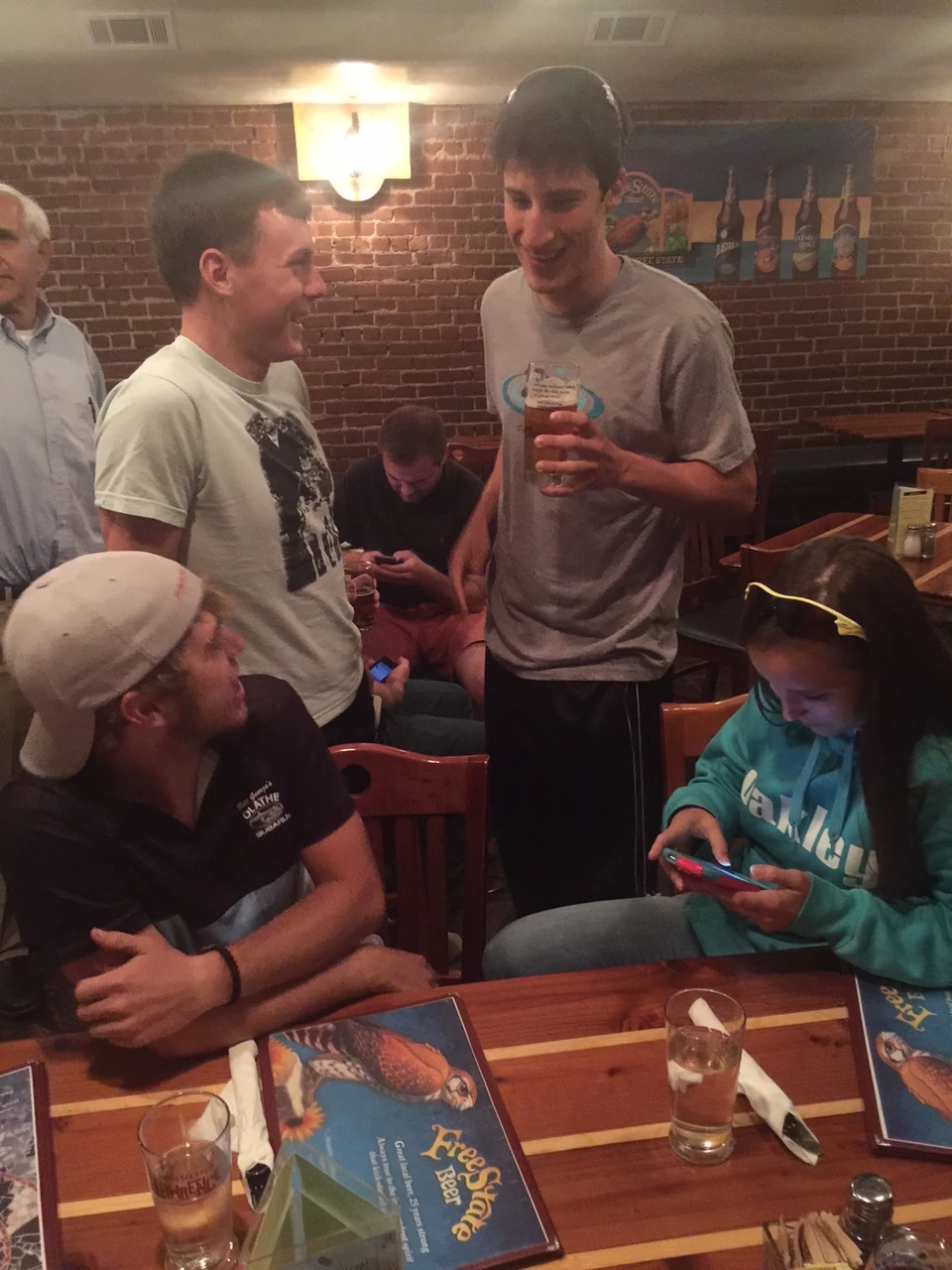 We met up with a bunch of people at Freestate Brewery, in Lawrence. Joseph Schmalz, who just finished Tour of California an Pro Nationals was there telling how those races went. He is on the left, talking to Garrick Valverde, Cliff Drive winner. (Bad boy Garrick, drinking beer during a stage race.)