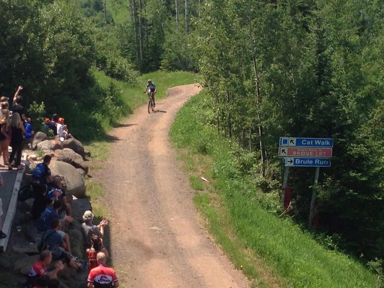 Climbing up the finish hill. It was super cool, riding under a bridge that was lined with people. The crowd was pretty great.