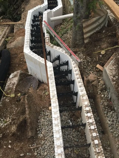 After a couple beers, I started helping with a small retaining wall.