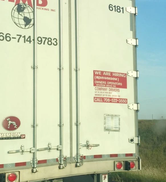 I saw this truck and was wondering what the writing meant? Any ideas? What language?
