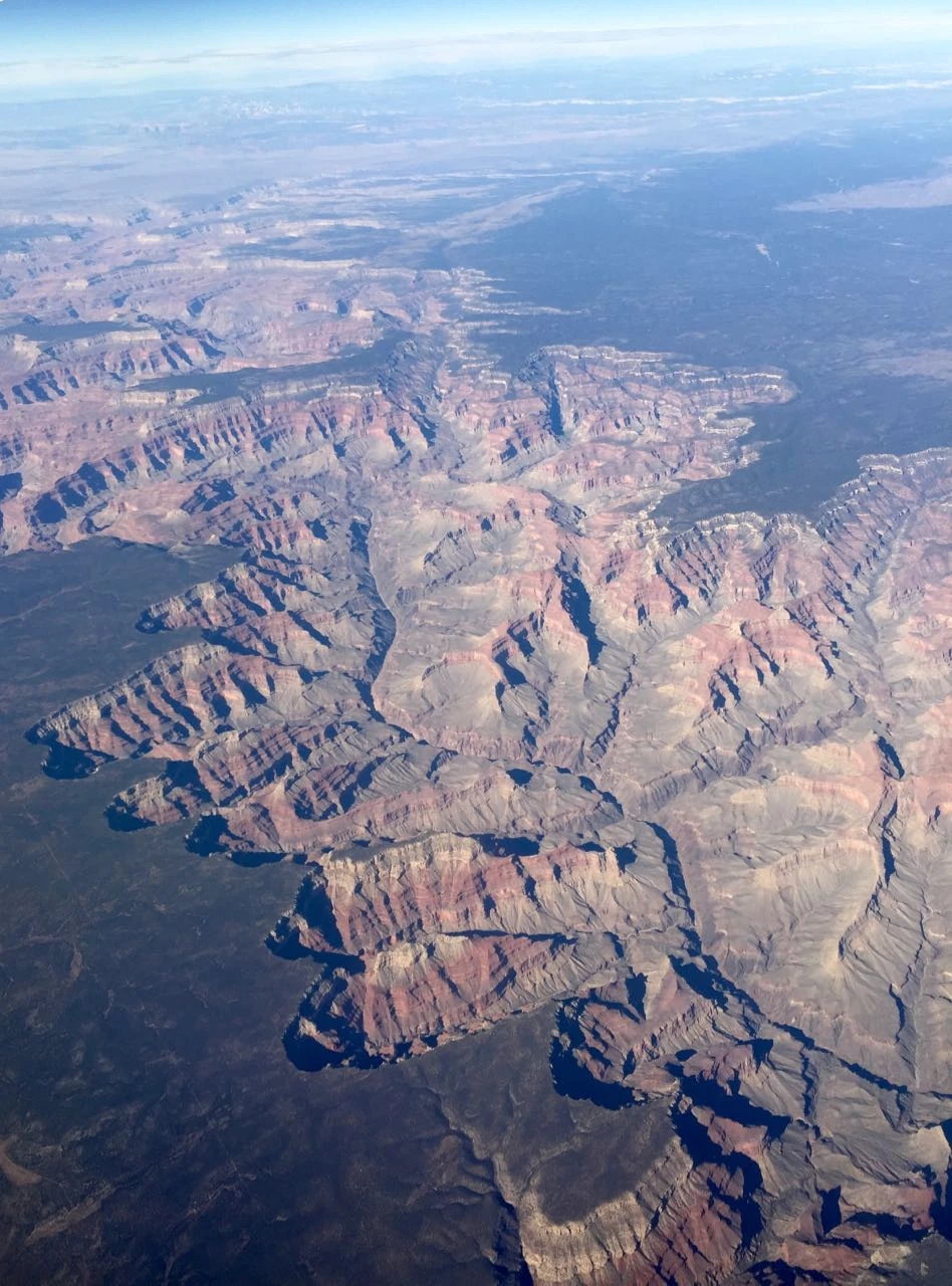 The pilot said this was the grand canyon. I&rsquo;m not sure it is, but it is dramatic. I love looking out the window flying.