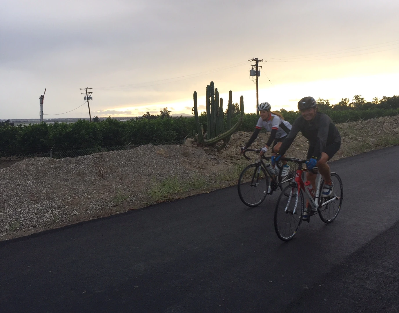 Jimmy Mac and Sue out riding yesterday at sunset. We got a little wet, but it felt pretty good.