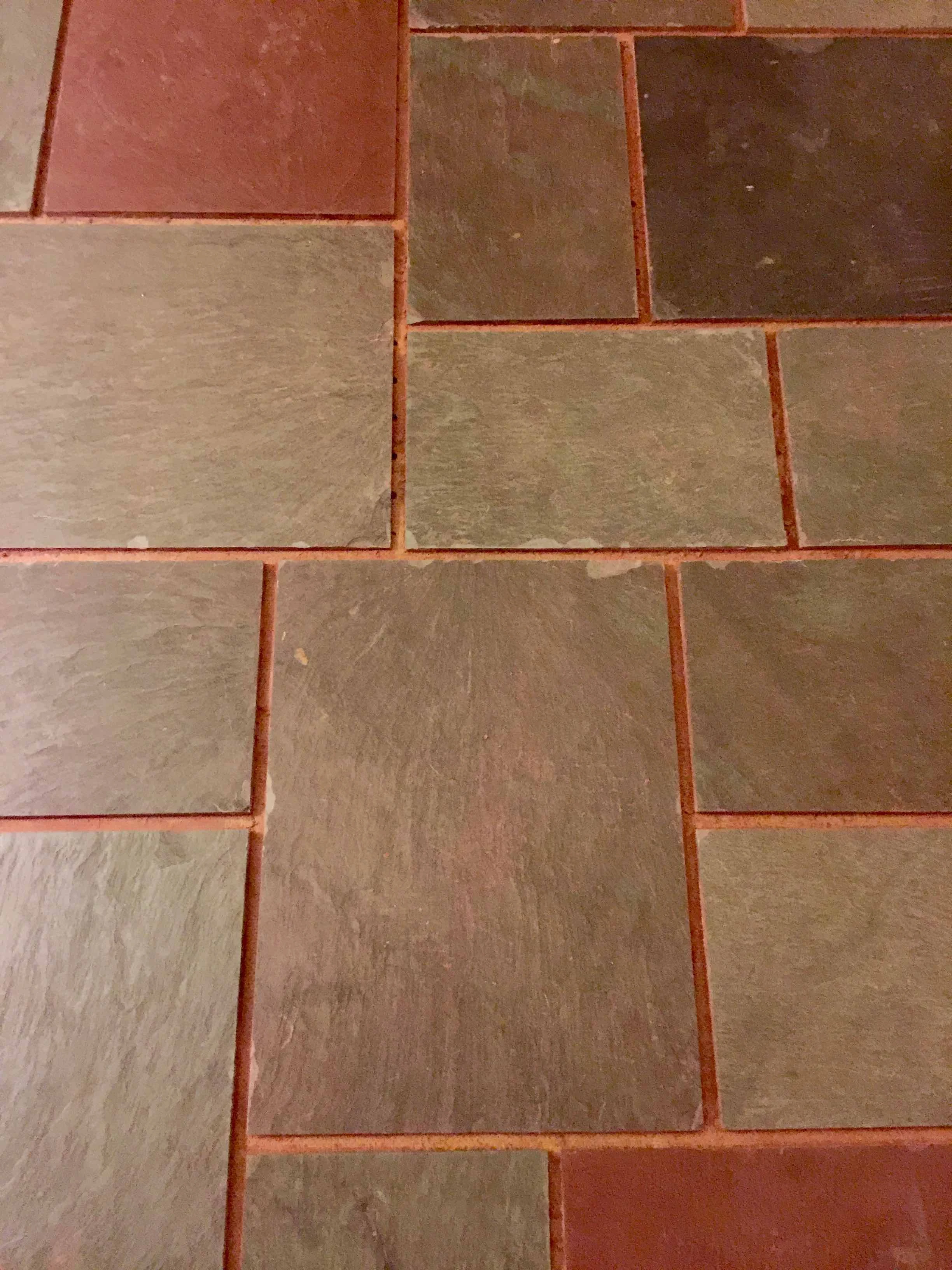 It was super easy to remove. You can see the masonite in the cracks.