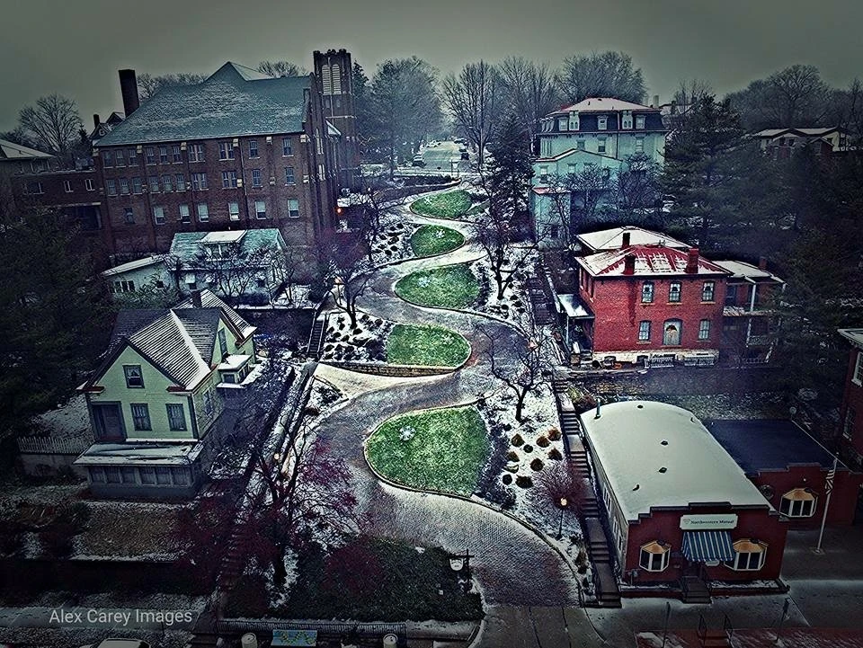 I saw this photograph of Snake Alley on Facebook. It is by Alex Carey. The guy has a super eye. Probably my favorite place to race bikes.
