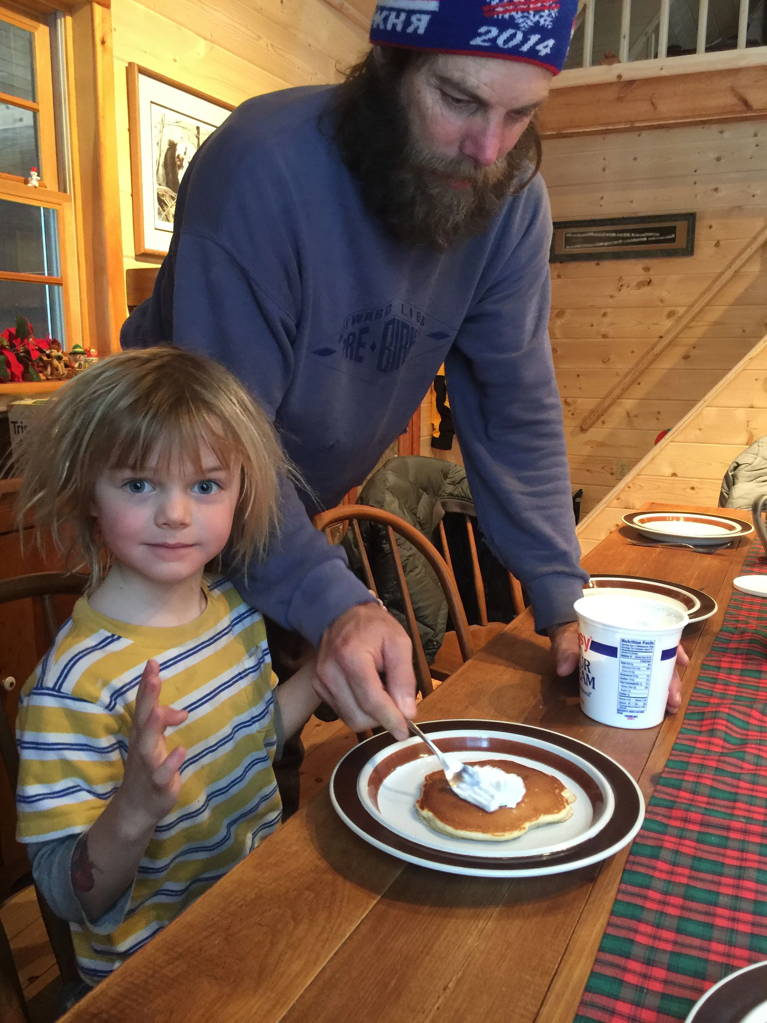 This Gavi, George and Yulyia boy. He eats sour cream on his pancakes. Julyia is from Russia.