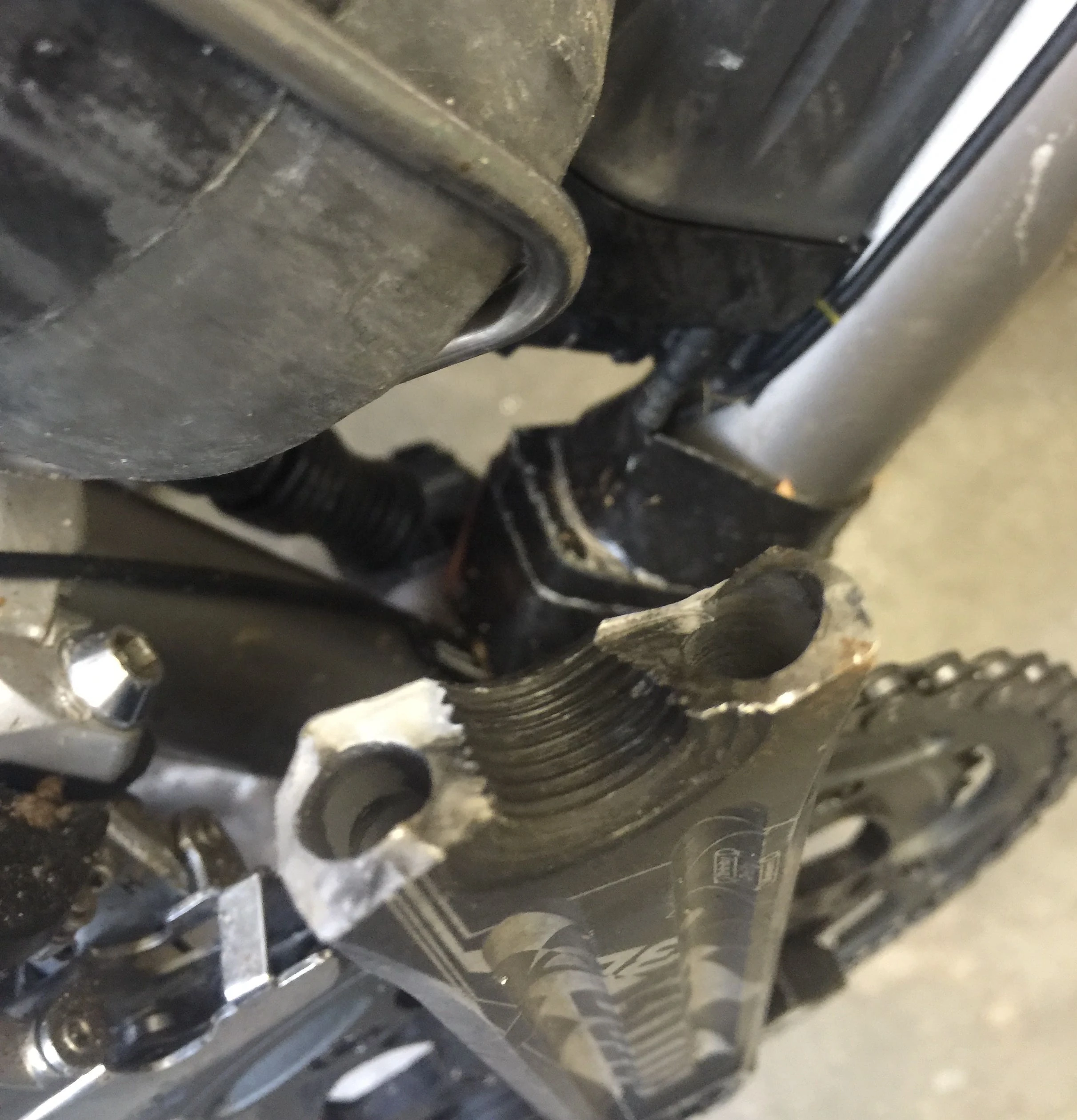 Culprit. By the color of the aluminum, it looks like it had been cracked before it broke.